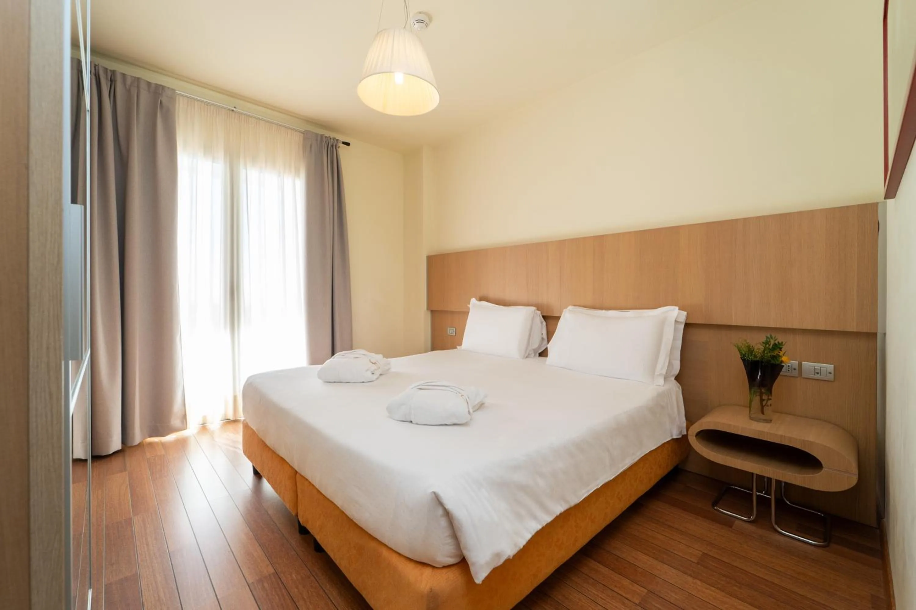 Bed in Bibione Palace Hotel