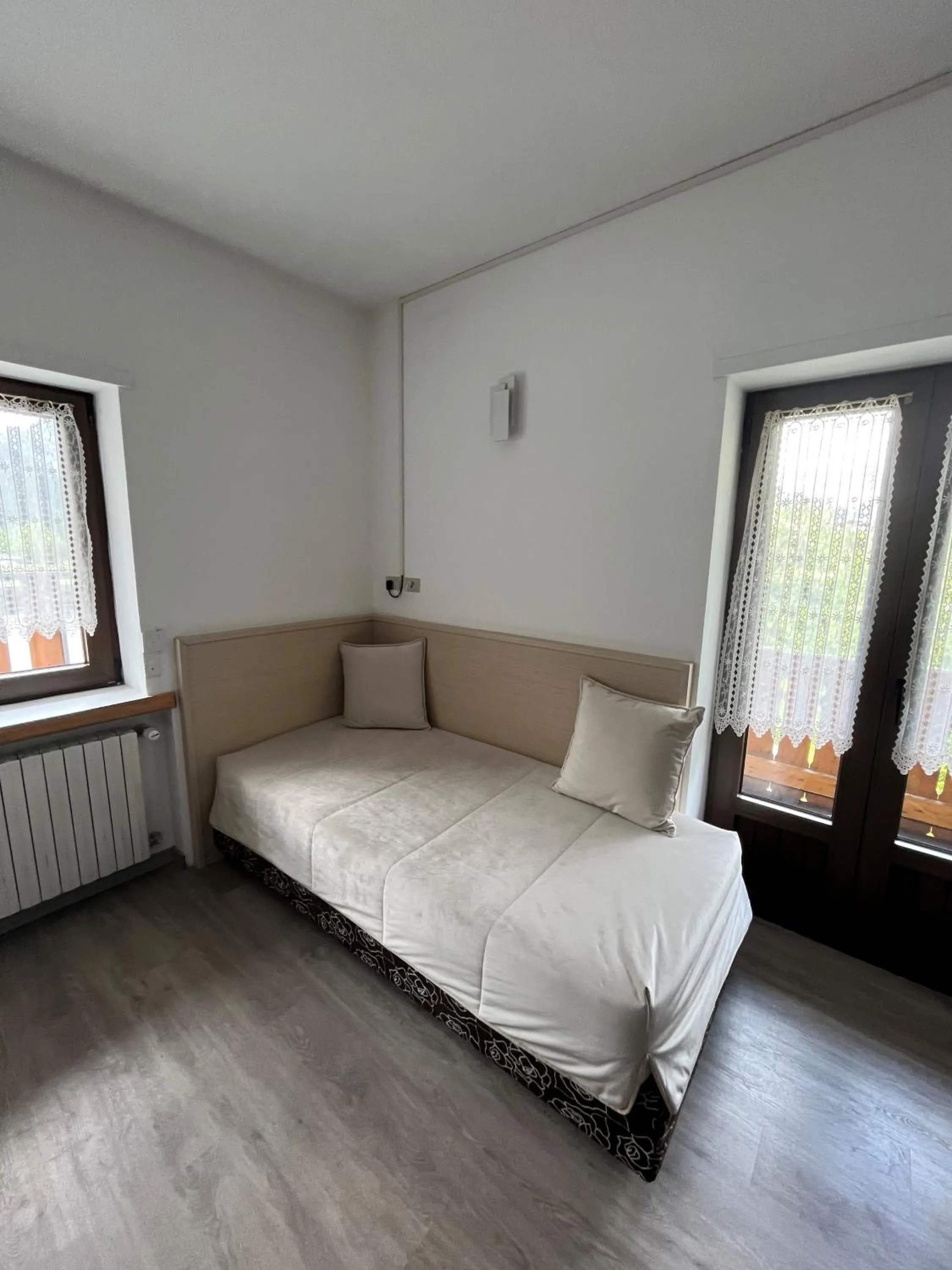 Bed in Monaco Sport Hotel