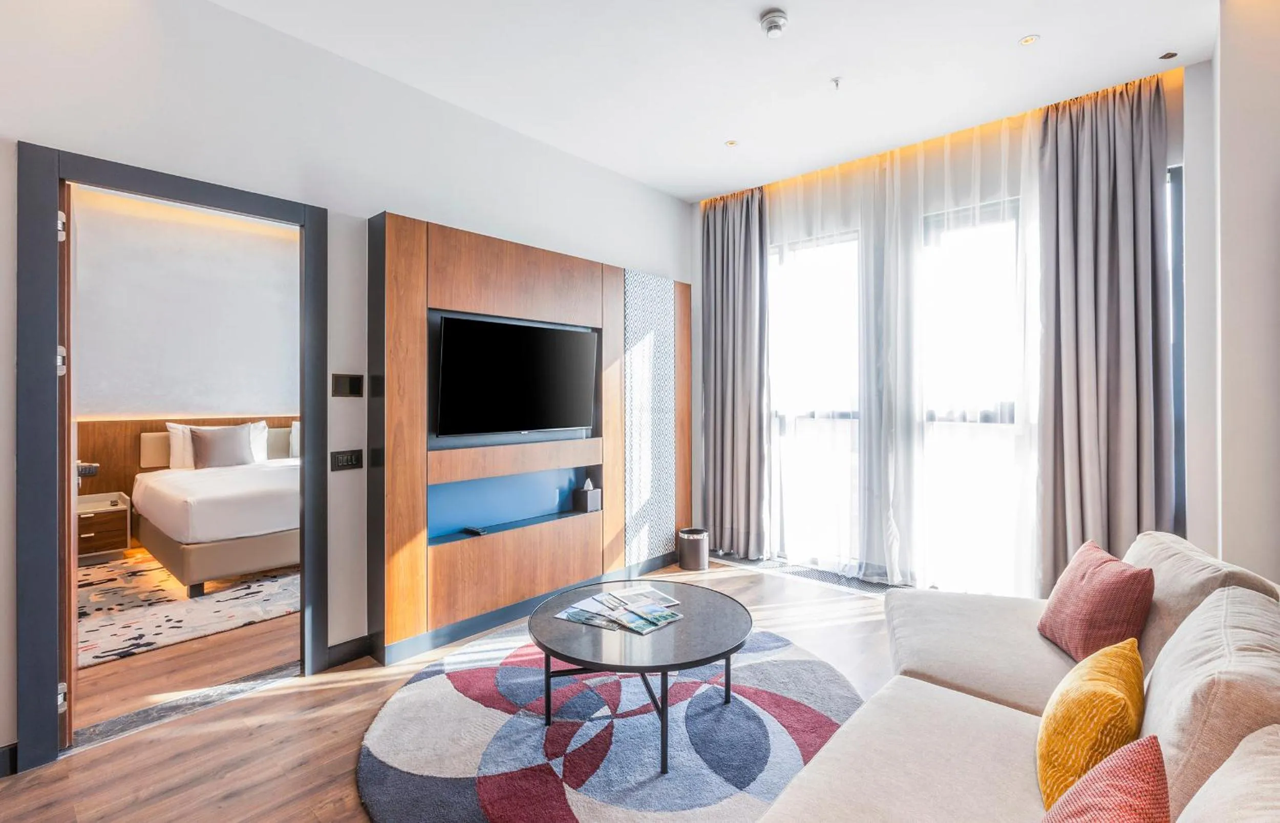 Seating area, Bed in Hilton Garden Inn Samarkand Afrosiyob