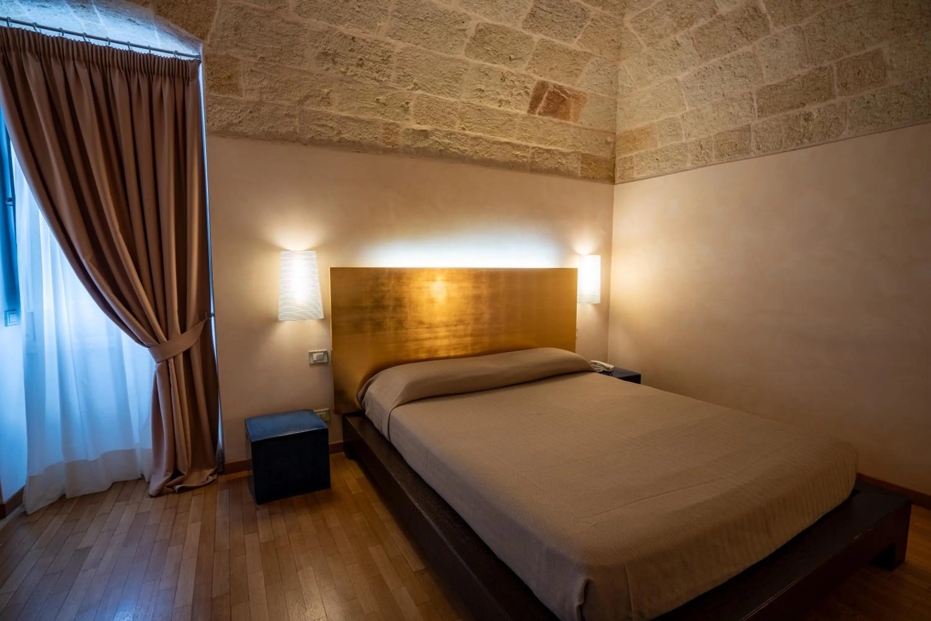 Bed in San Tommaso Hotel