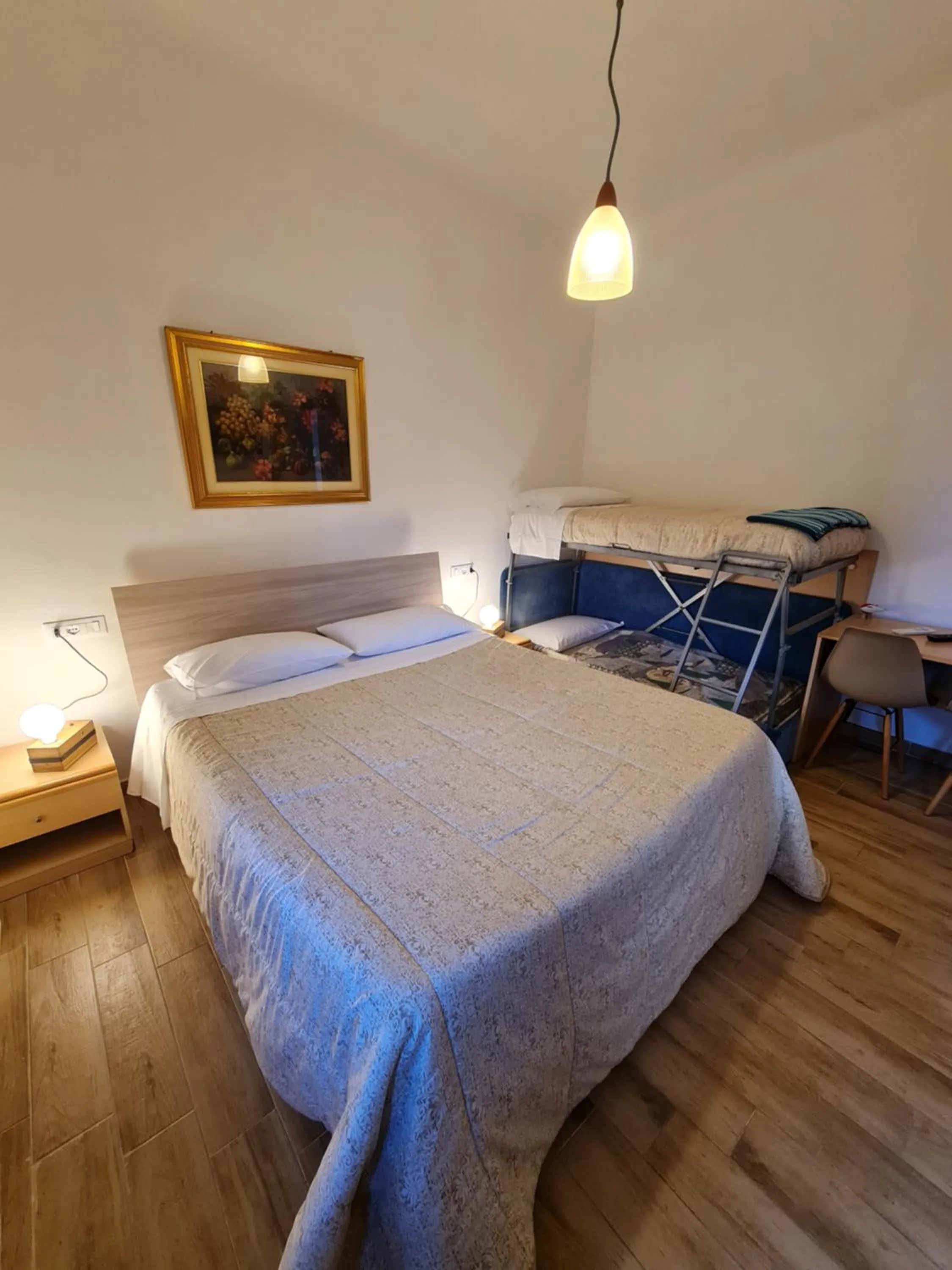 Bed in Albergo Genio