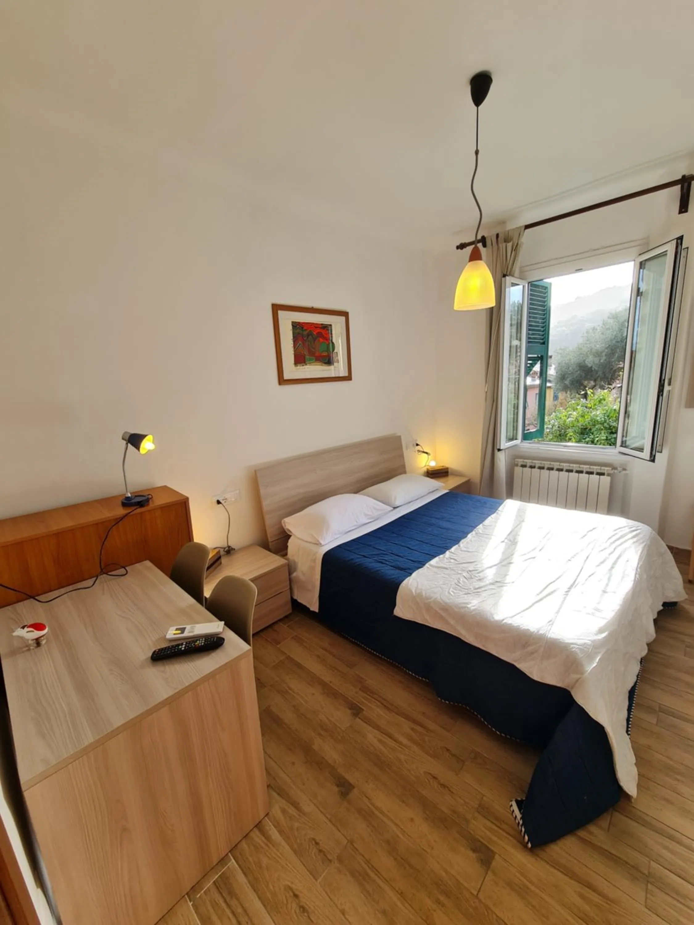 View (from property/room), Bed in Albergo Genio