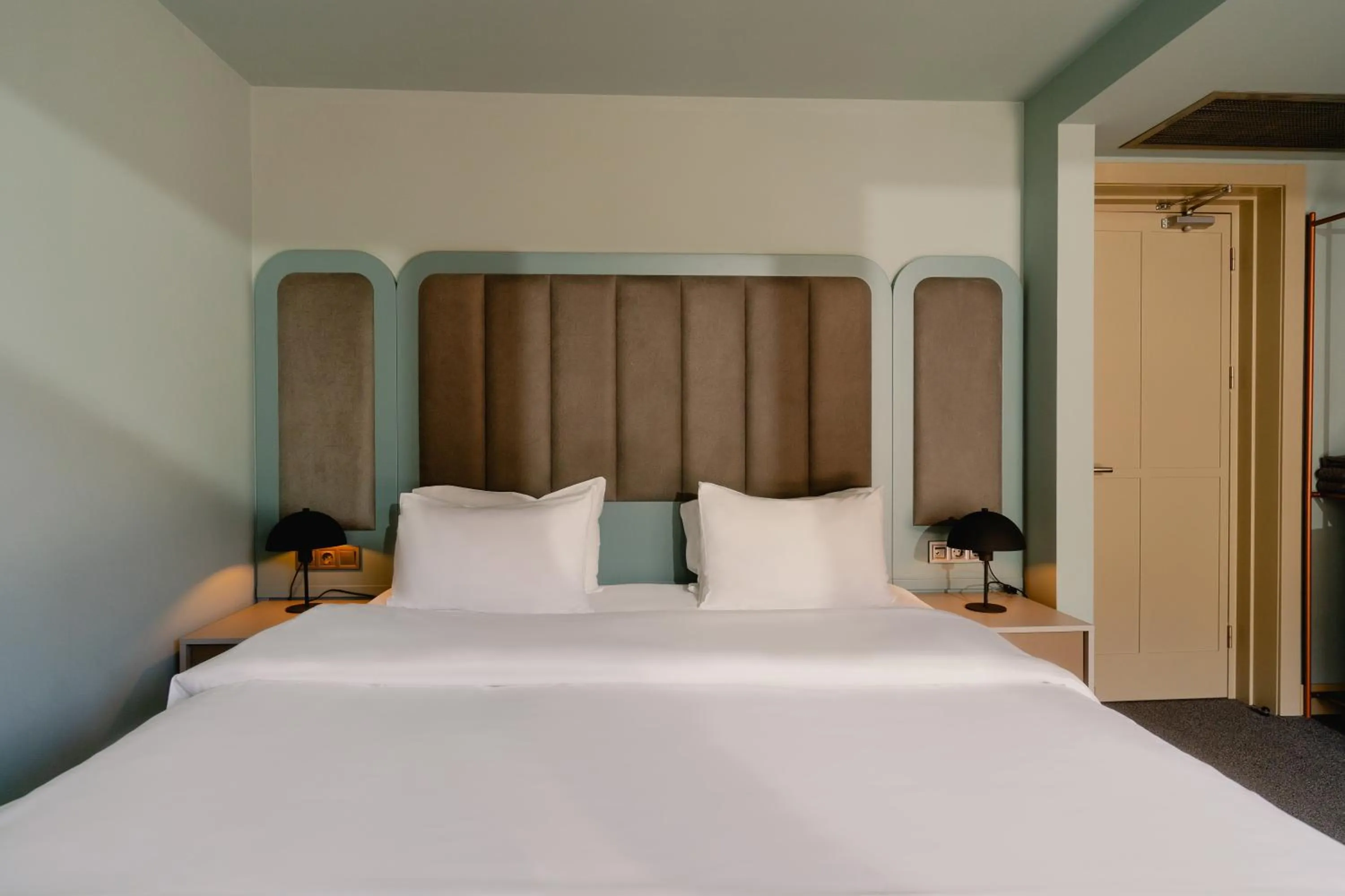 Bed in STROFI Boutique Hotel