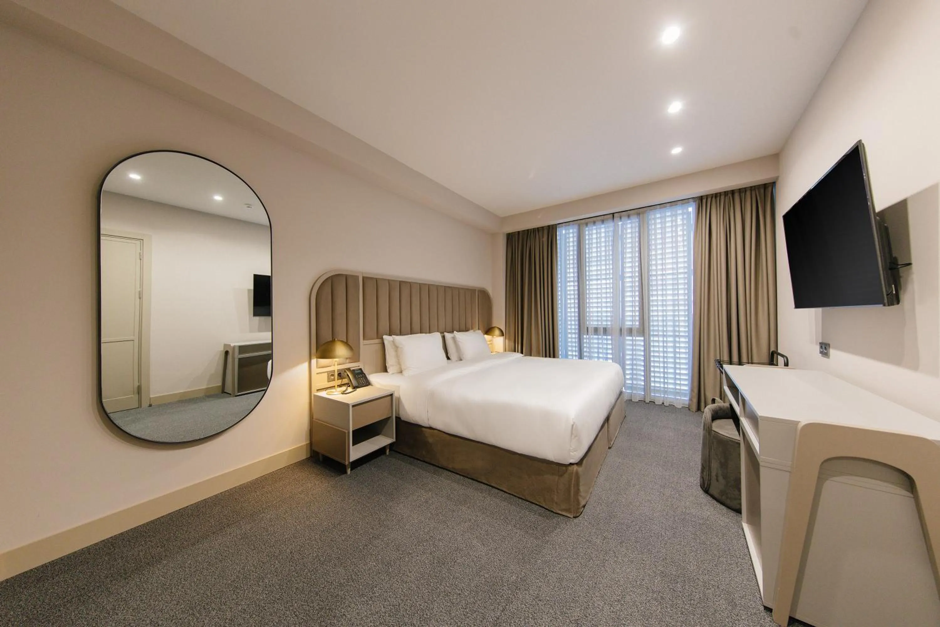 Bed in STROFI Boutique Hotel