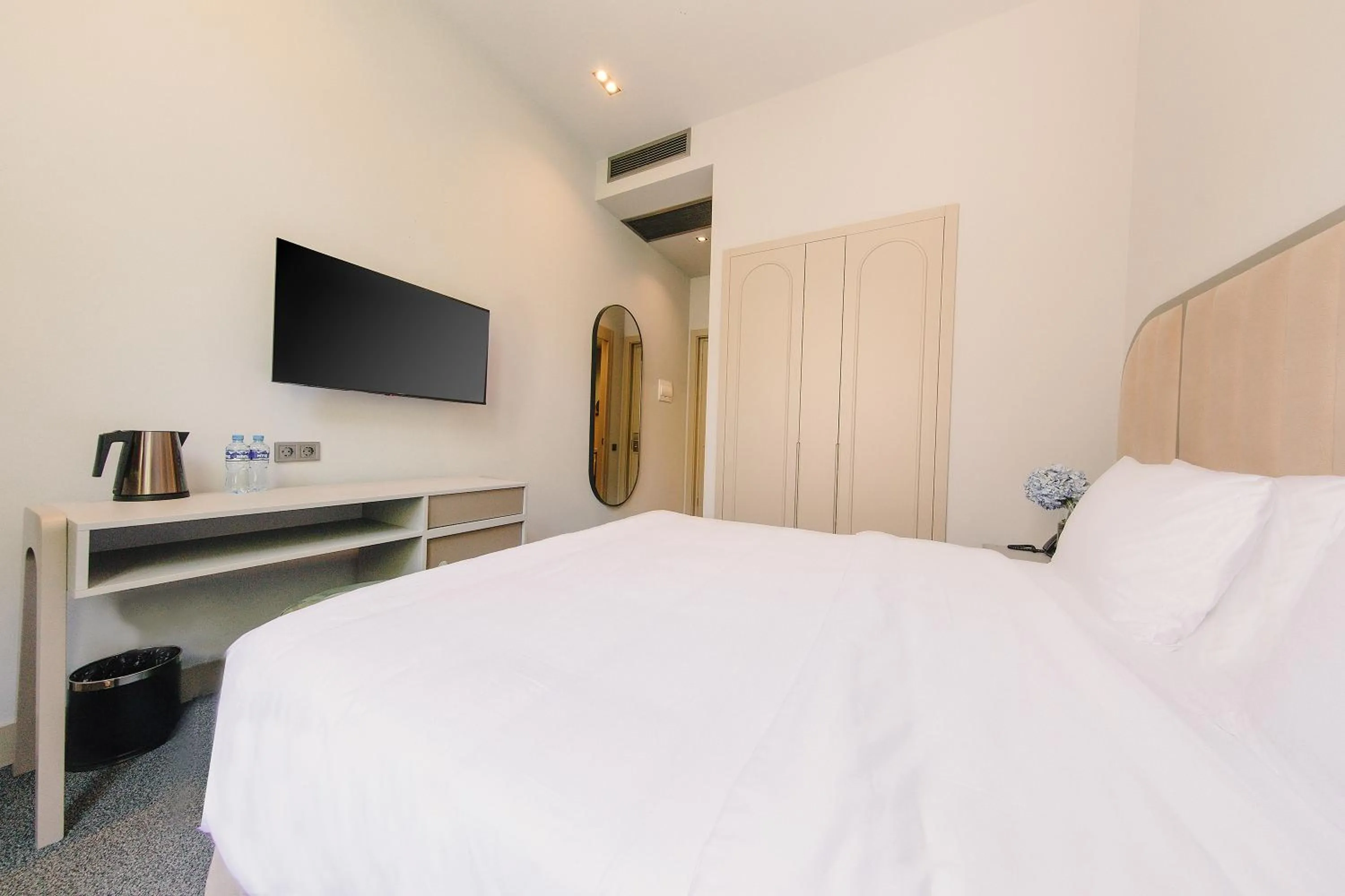 Bed in STROFI Boutique Hotel