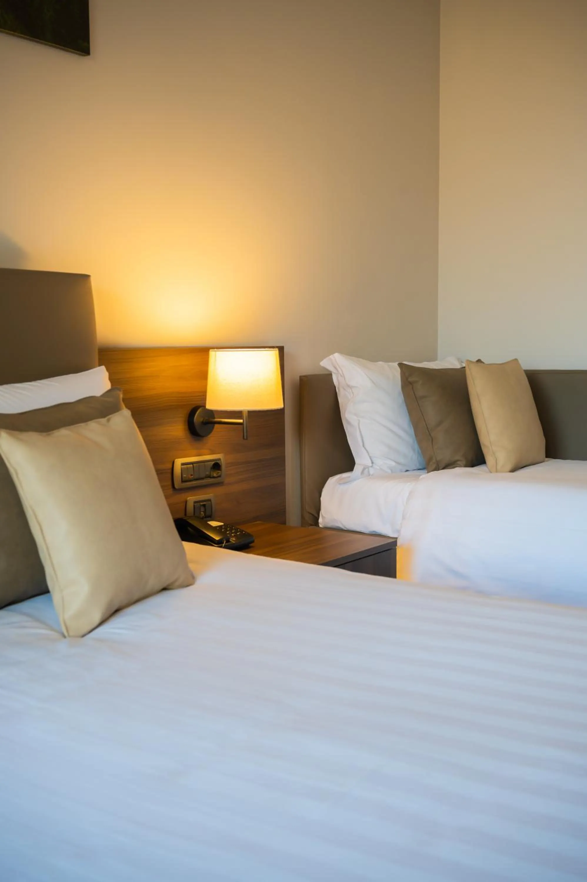 Bed in Ulivi Hotel & Residence