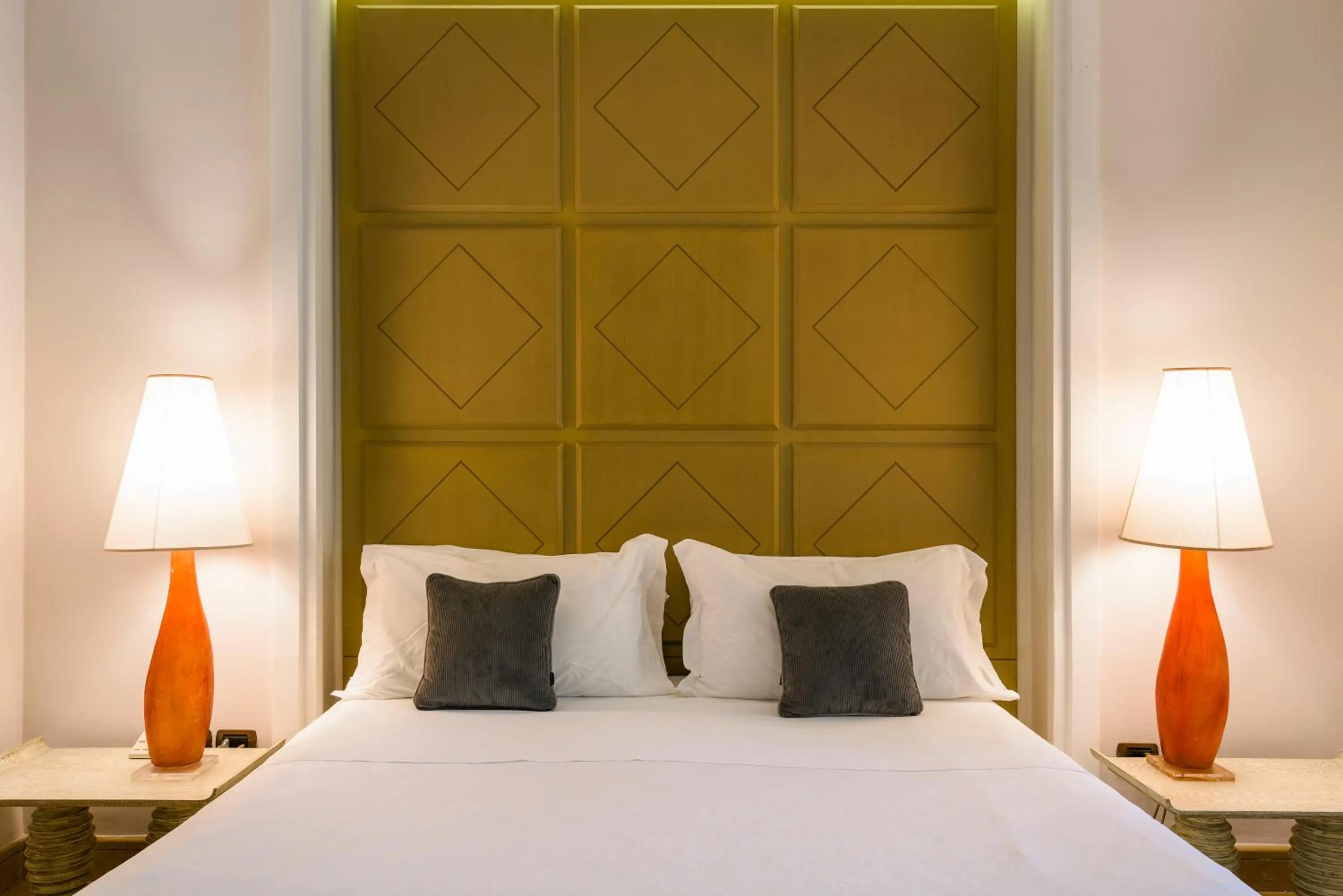 Bed in Romano Palace Luxury Hotel