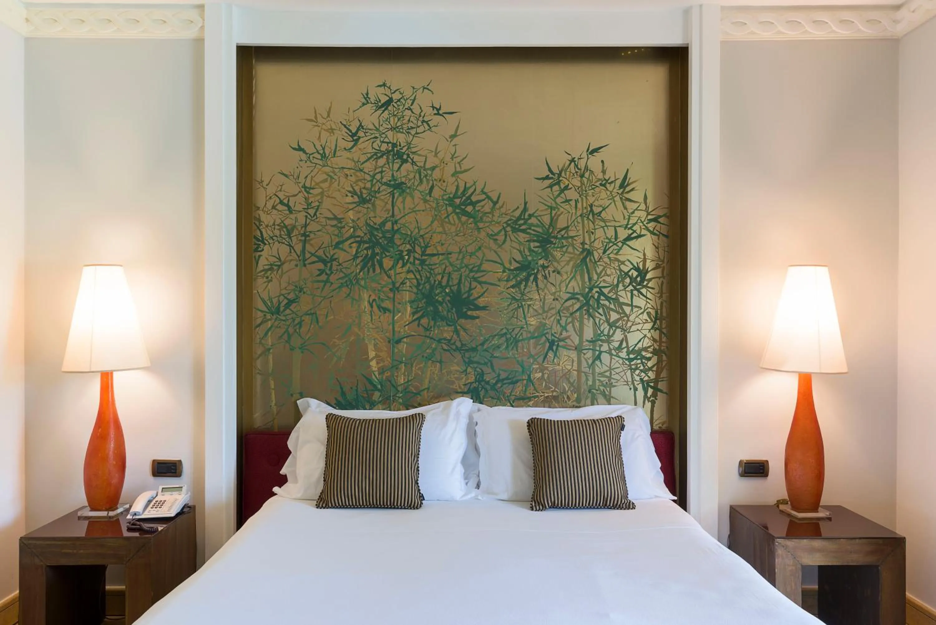 Bed in Romano Palace Luxury Hotel