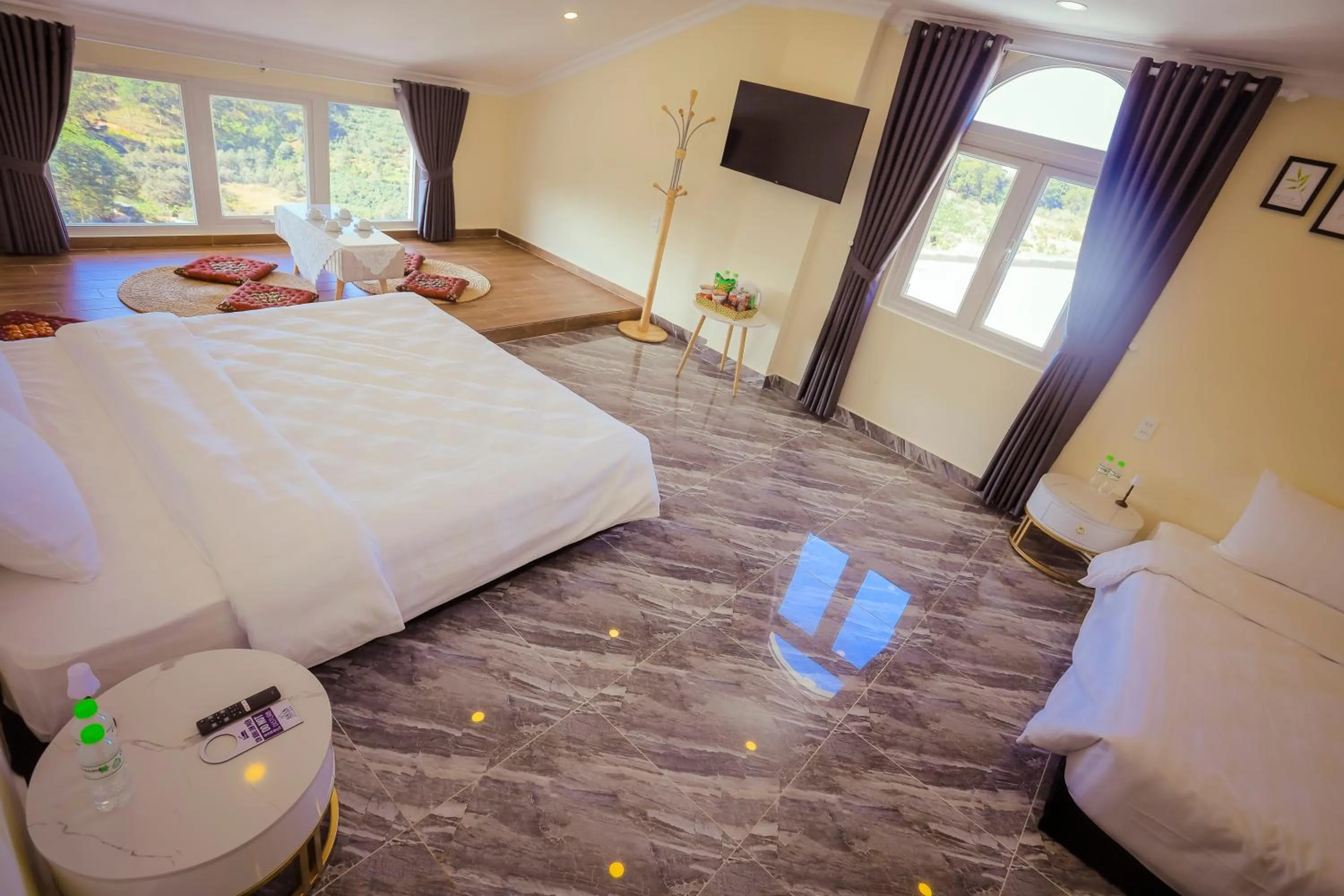 Bed in SHIN VILLAGE HOTEL