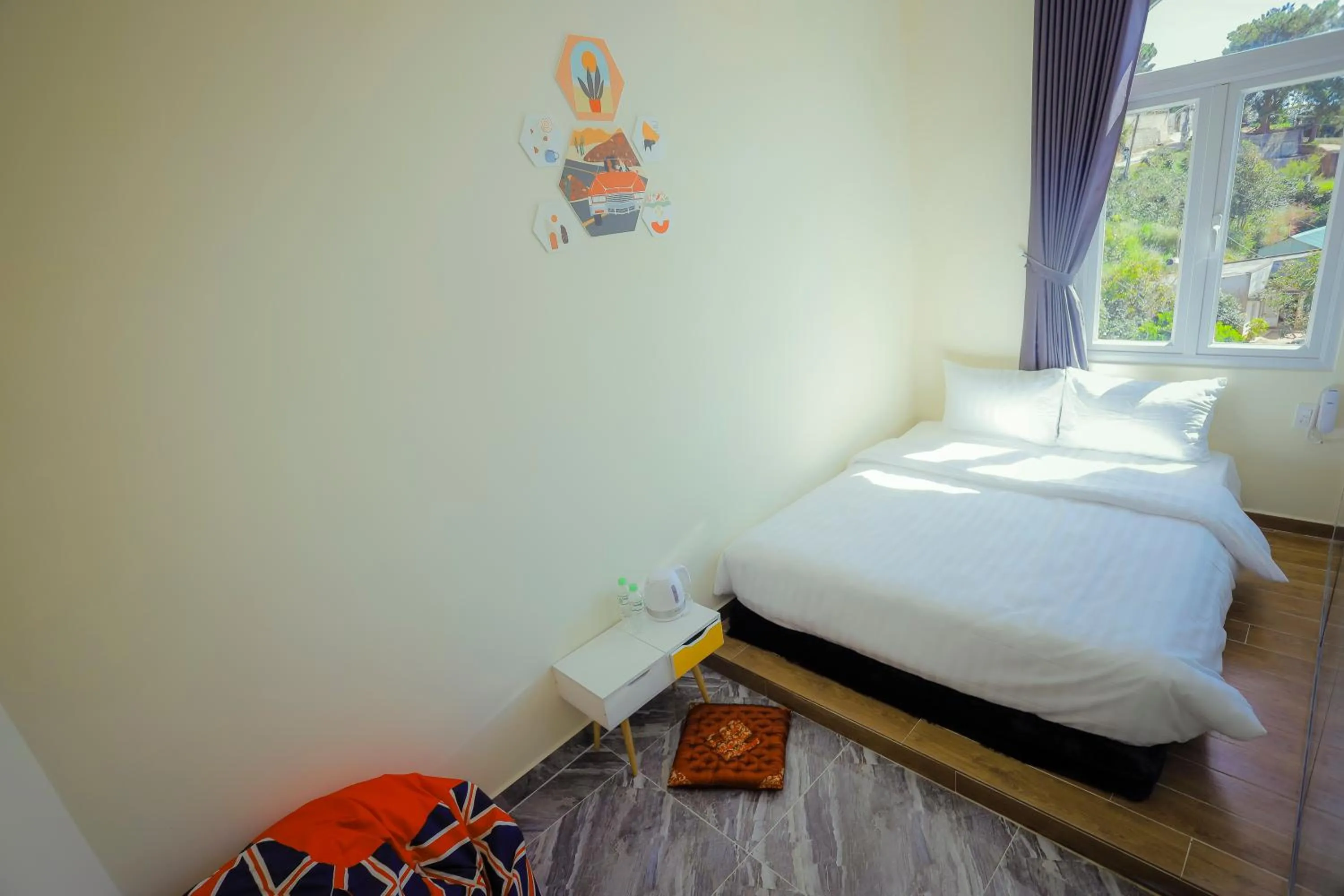 Bed in SHIN VILLAGE HOTEL