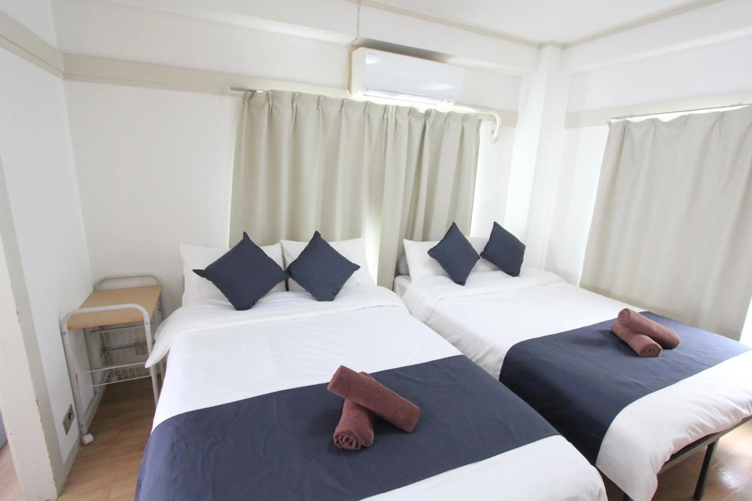 Bed in LUANAHOTEL IN WASEDA