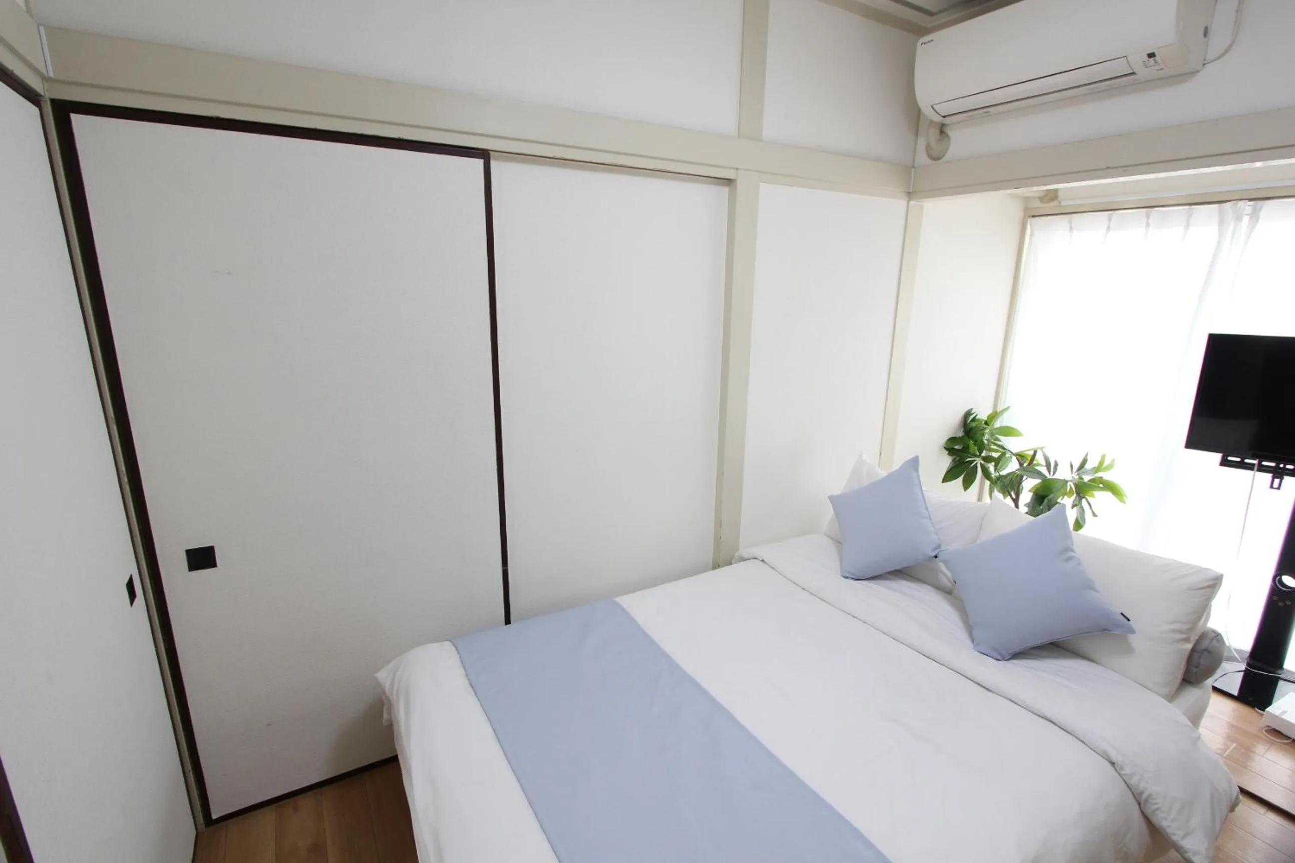 Bed in LUANAHOTEL IN WASEDA