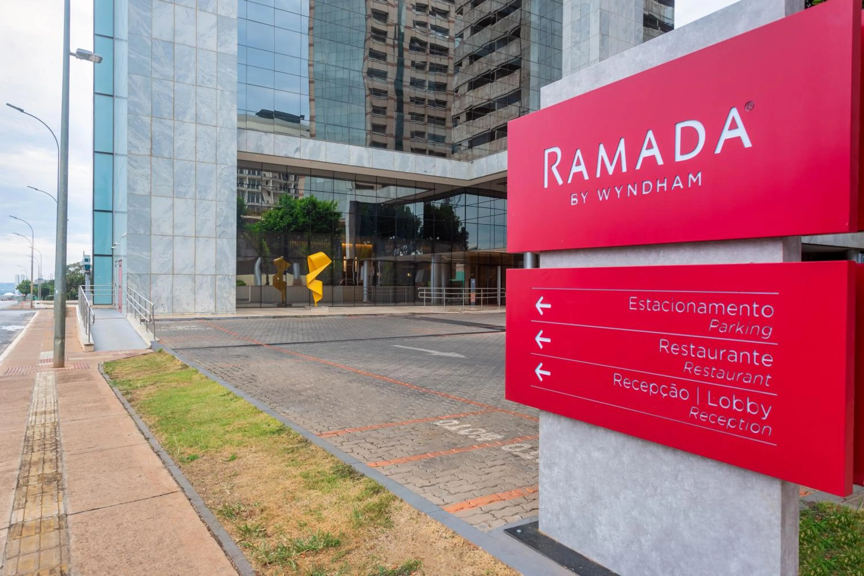Property logo or sign in Ramada by Wyndham Brasilia Alvorada