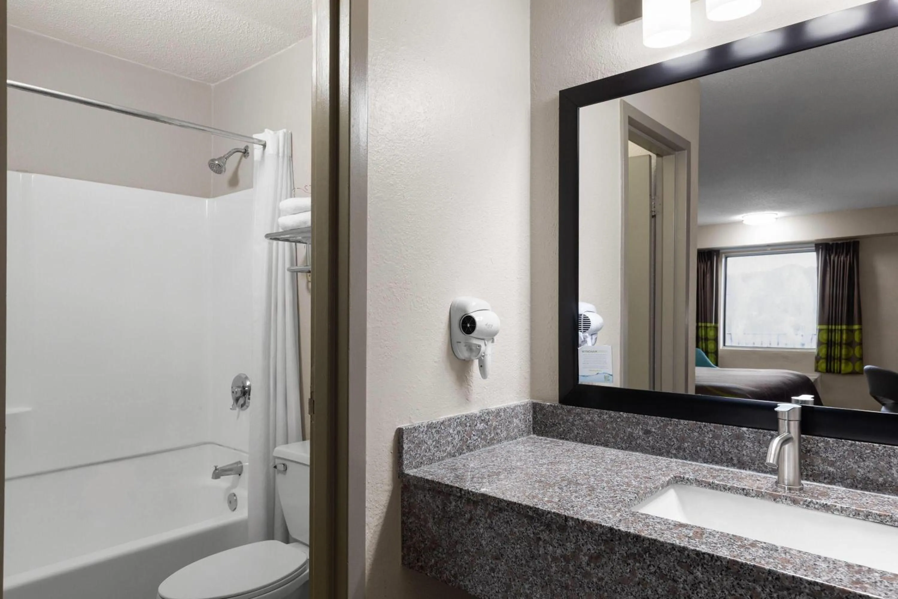 Bathroom in Super 8 by Wyndham Charleston WV