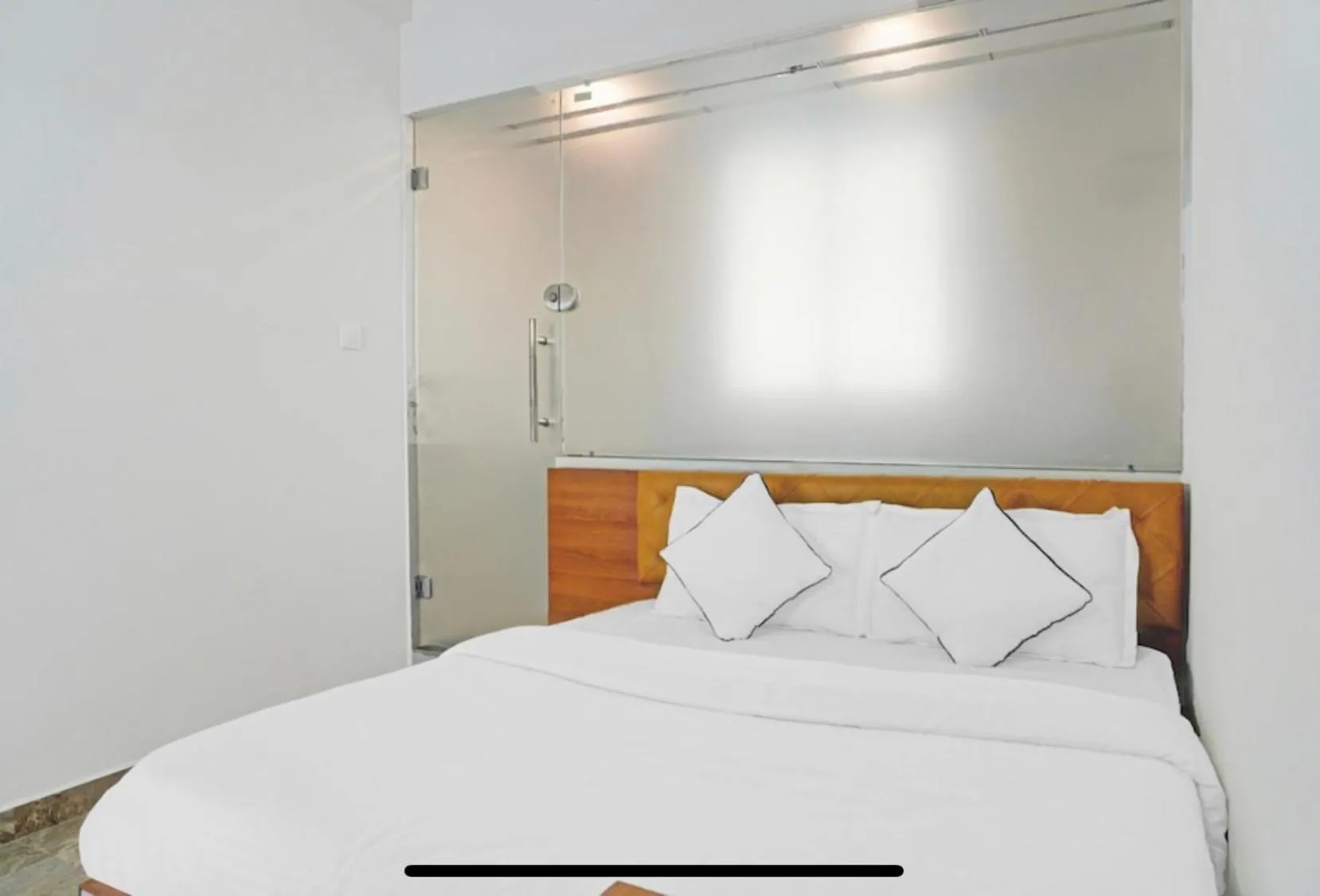 Bed in Hotel Santeria Inn, Best Luxurious Hotel AC Rooms In Surat