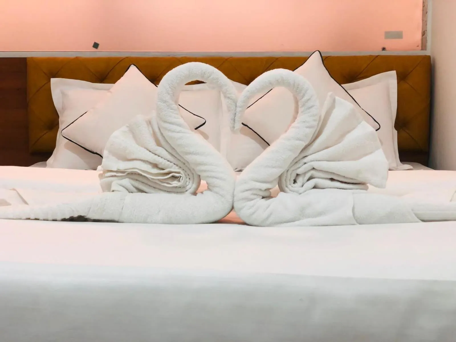 Bed in Hotel Santeria Inn, Best Luxurious Hotel AC Rooms In Surat