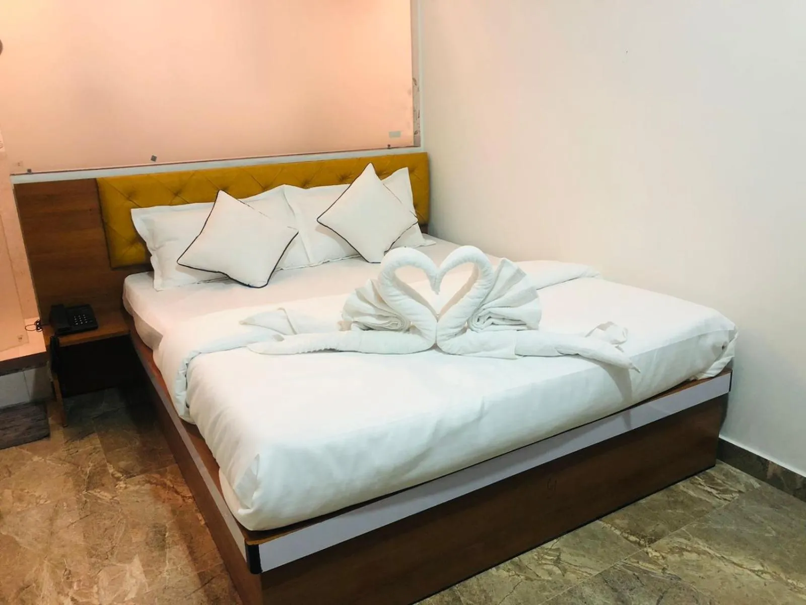 Bed in Hotel Santeria Inn, Best Luxurious Hotel AC Rooms In Surat