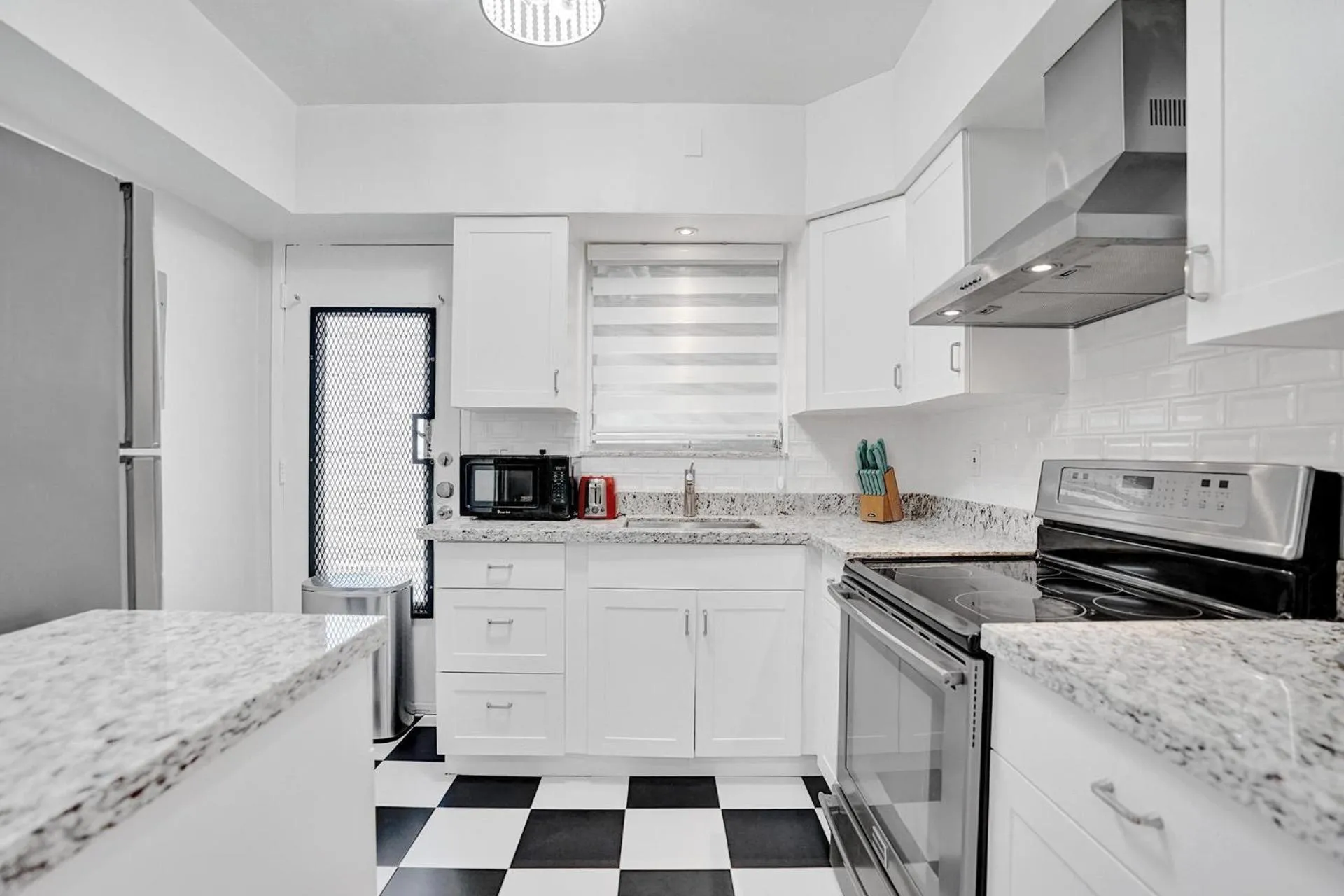 Kitchen or kitchenette in Bay Harbor Suites