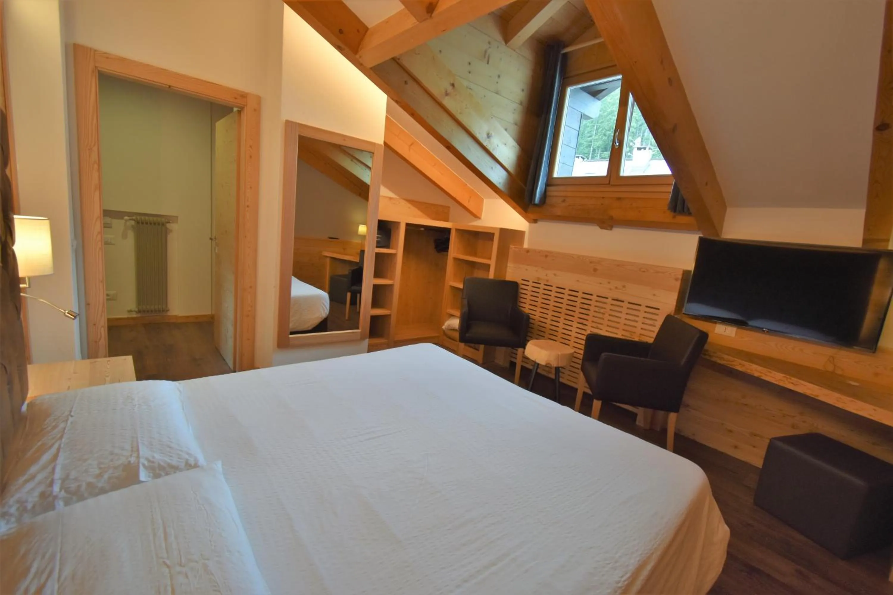 Photo of the whole room, Bed in Hotel Garni Arnica ***S