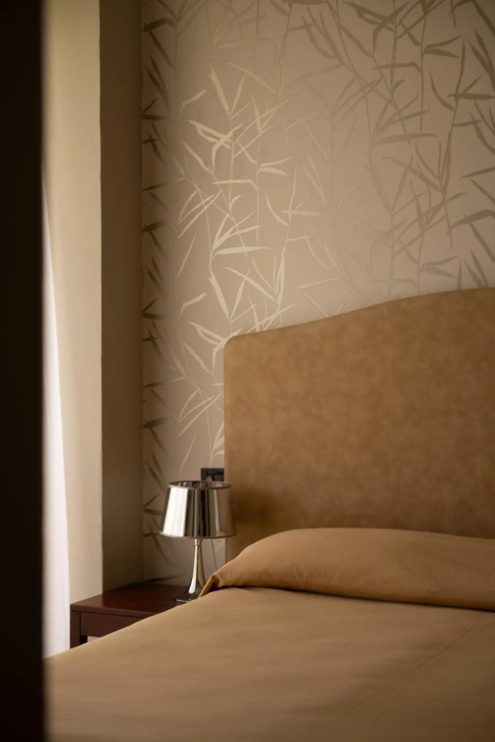 Bed in Hotel Corallo