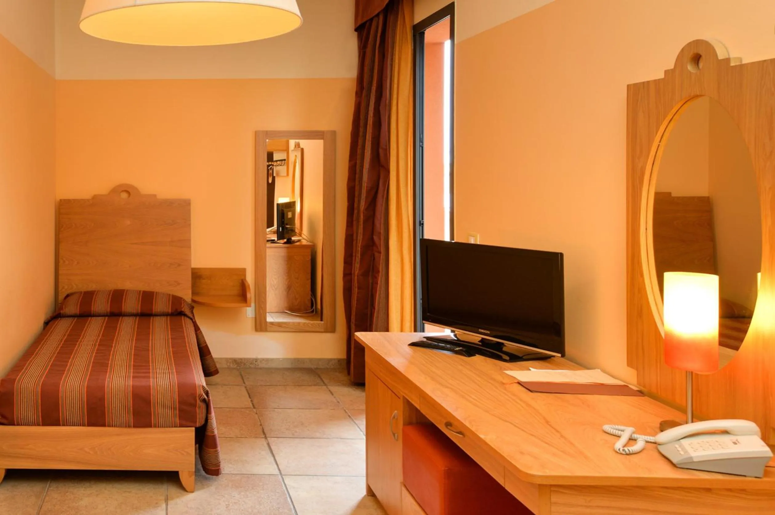 Bedroom in Il Tabacchificio Hotel