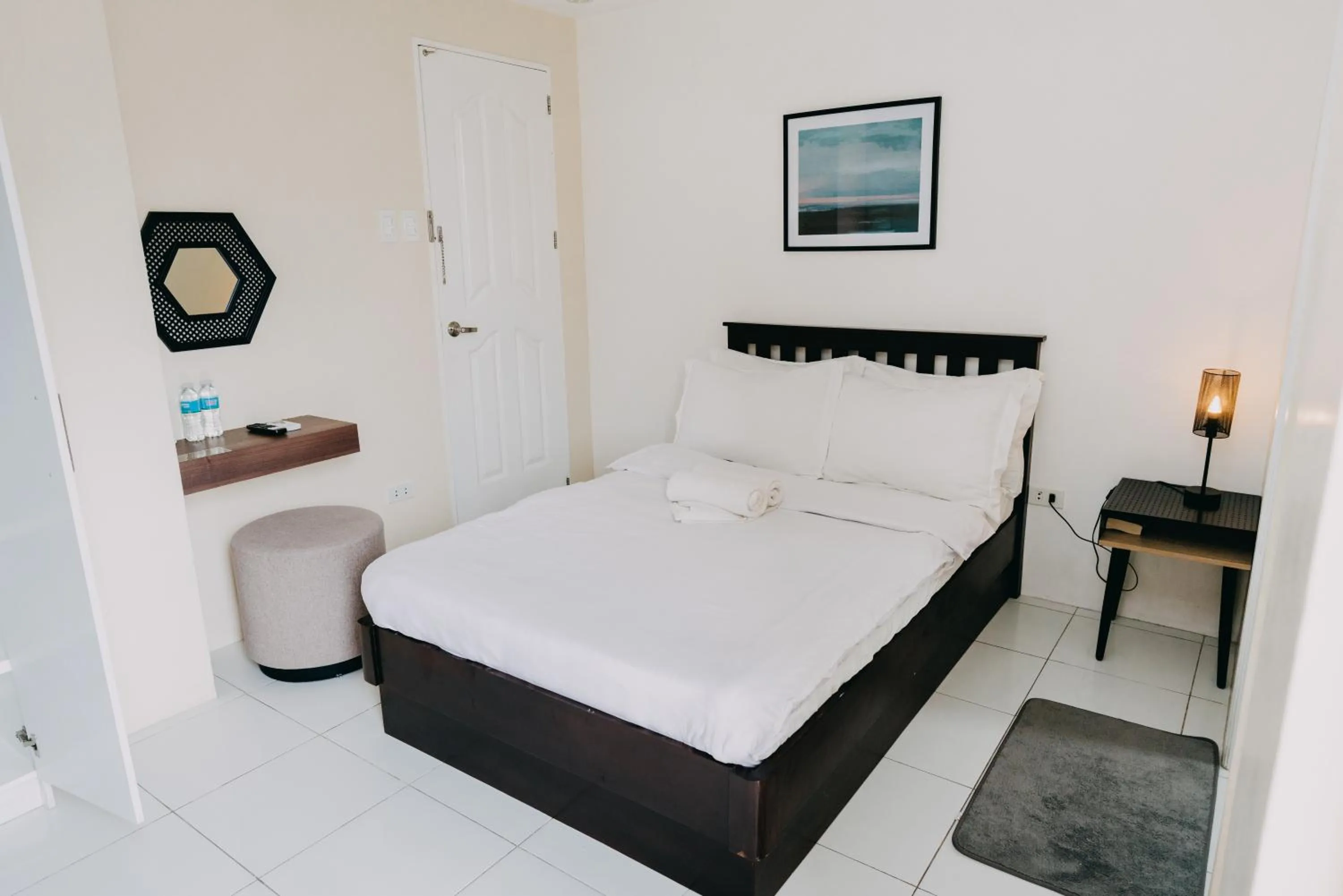 Bed in Nine Balconies Island Stay