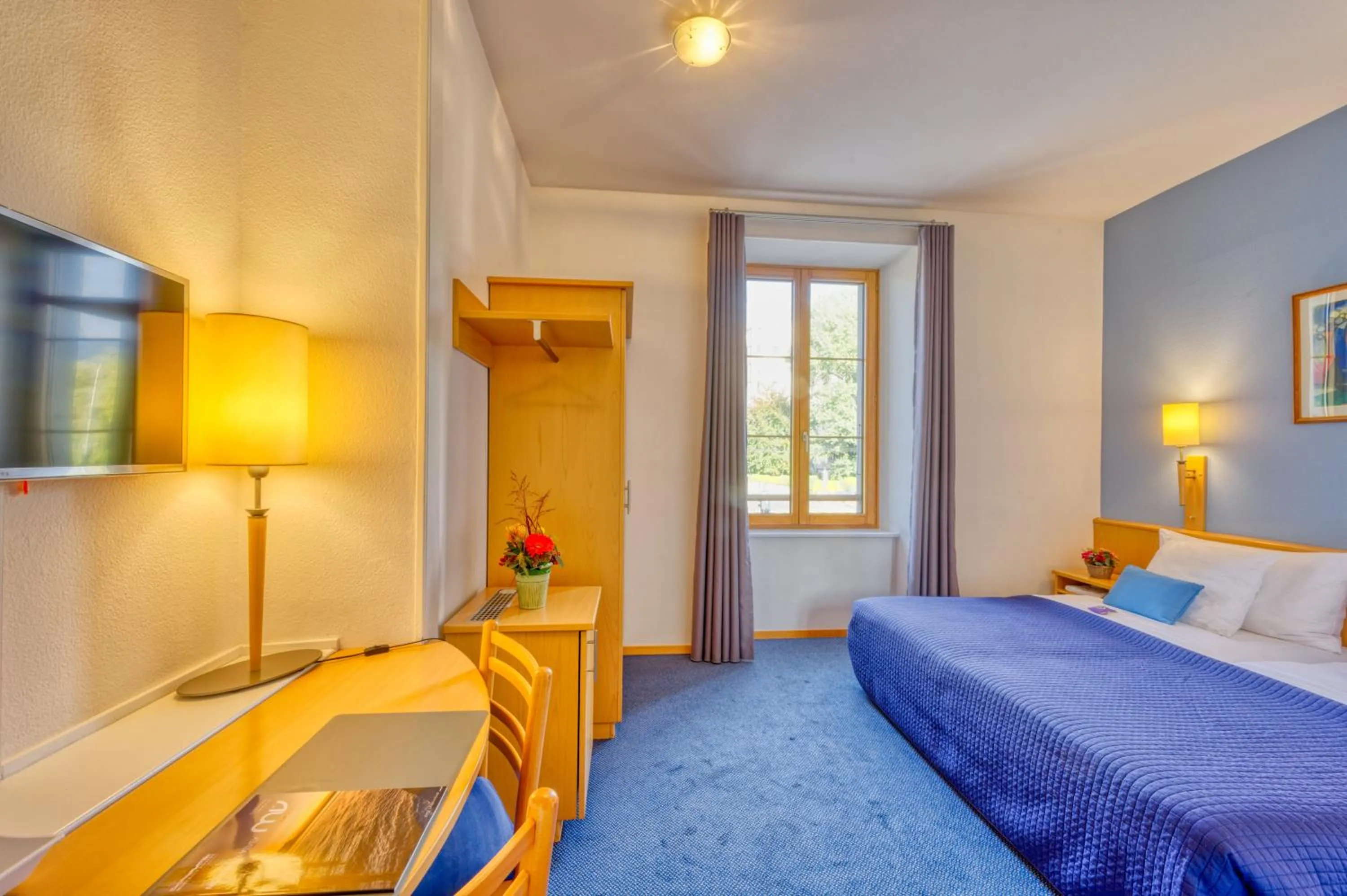 Bed in Hôtel Bon Rivage