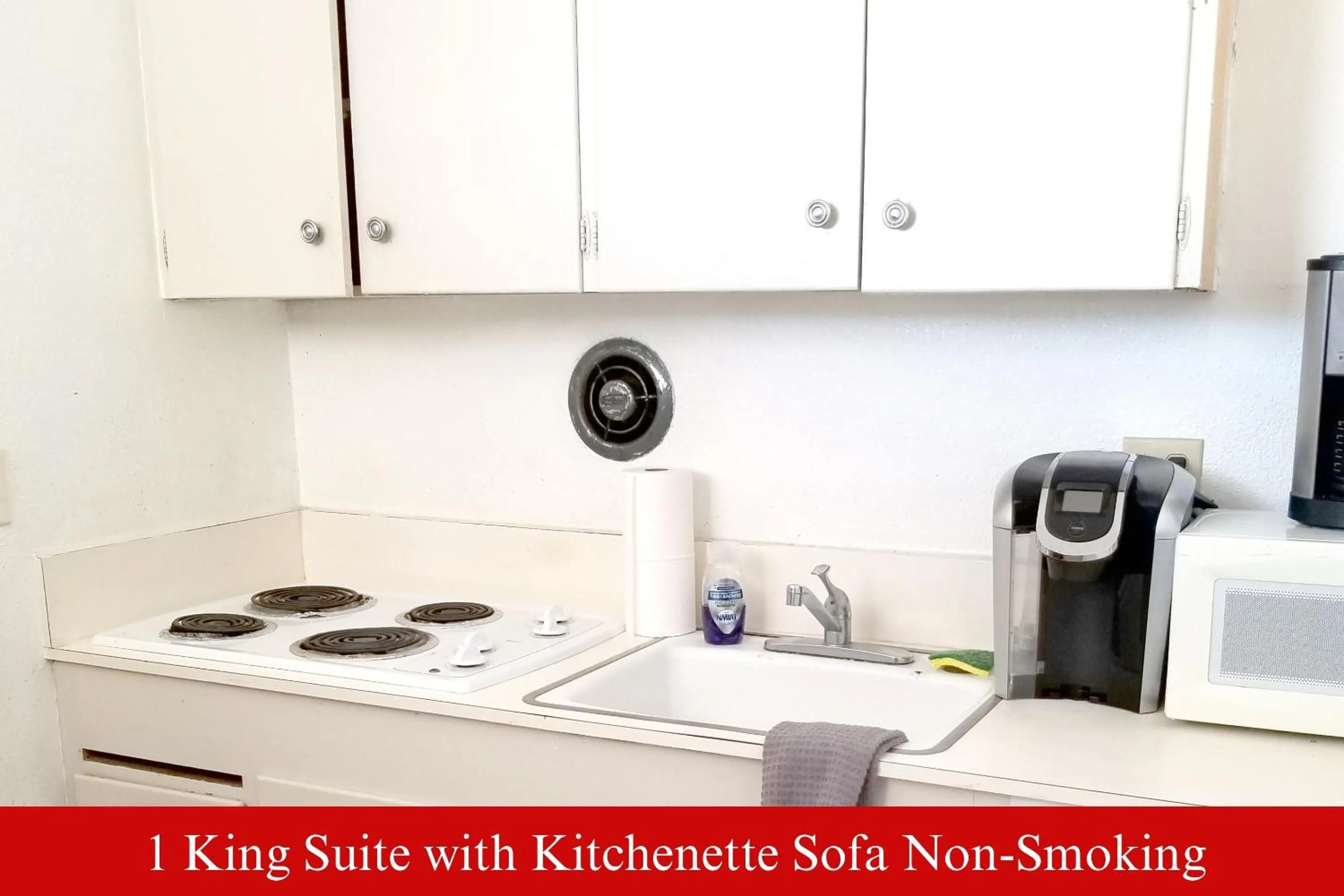 Kitchen or kitchenette in Coratel Inn & Suites by Jasper Hutchinson