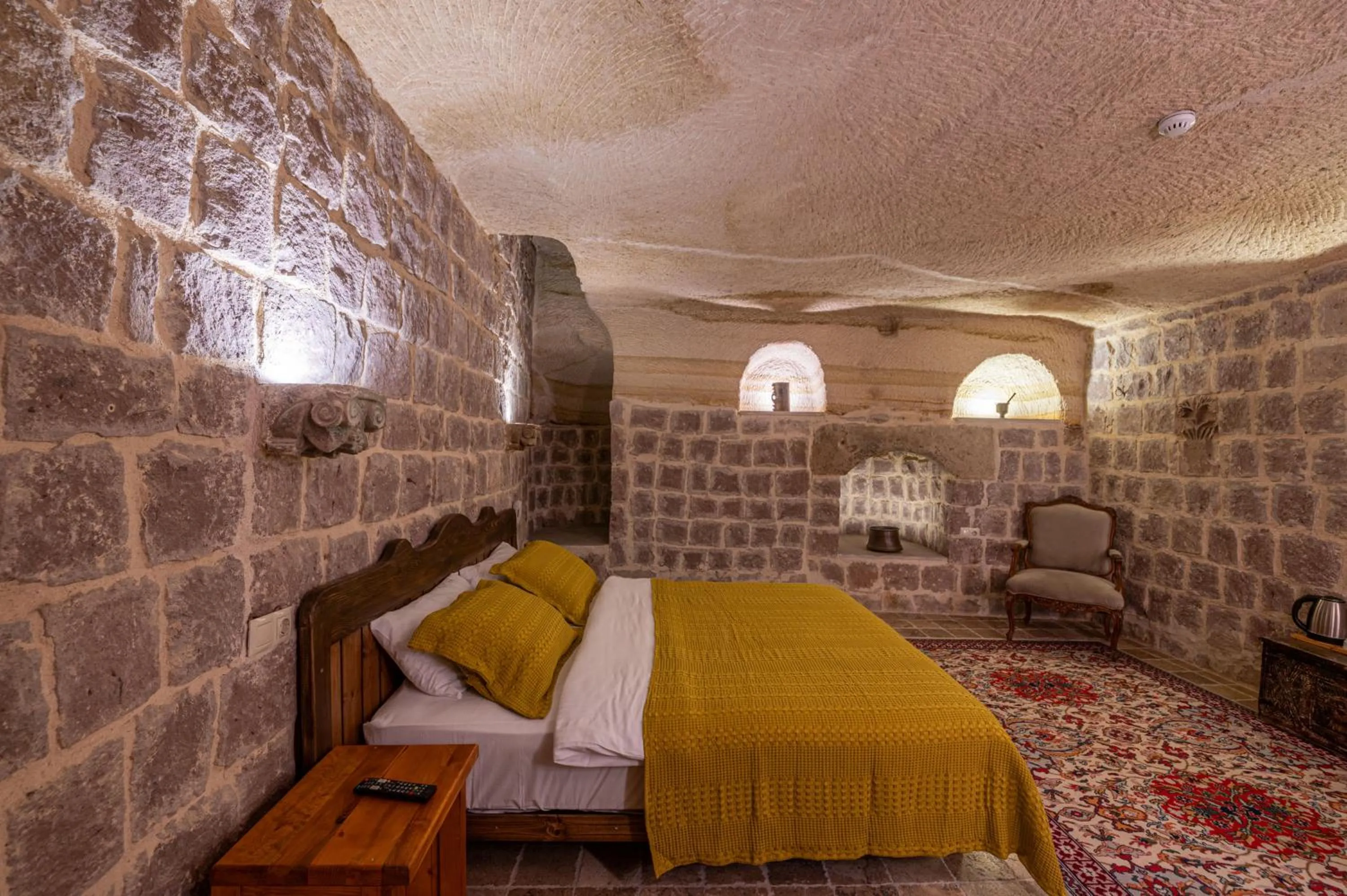 Bed in Kapalos Cave Hotel