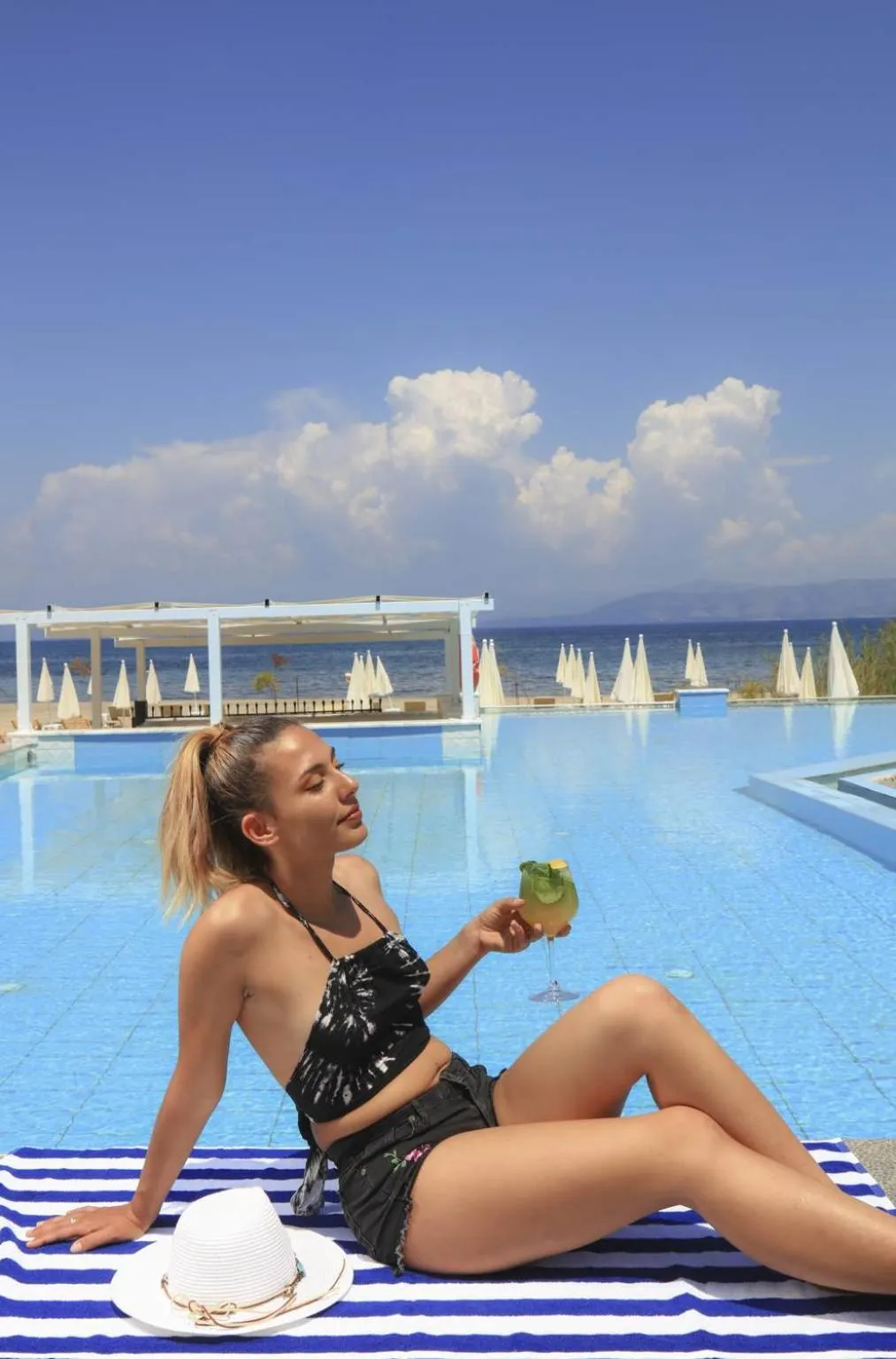 People in Cavomarina Beach- Adults Only