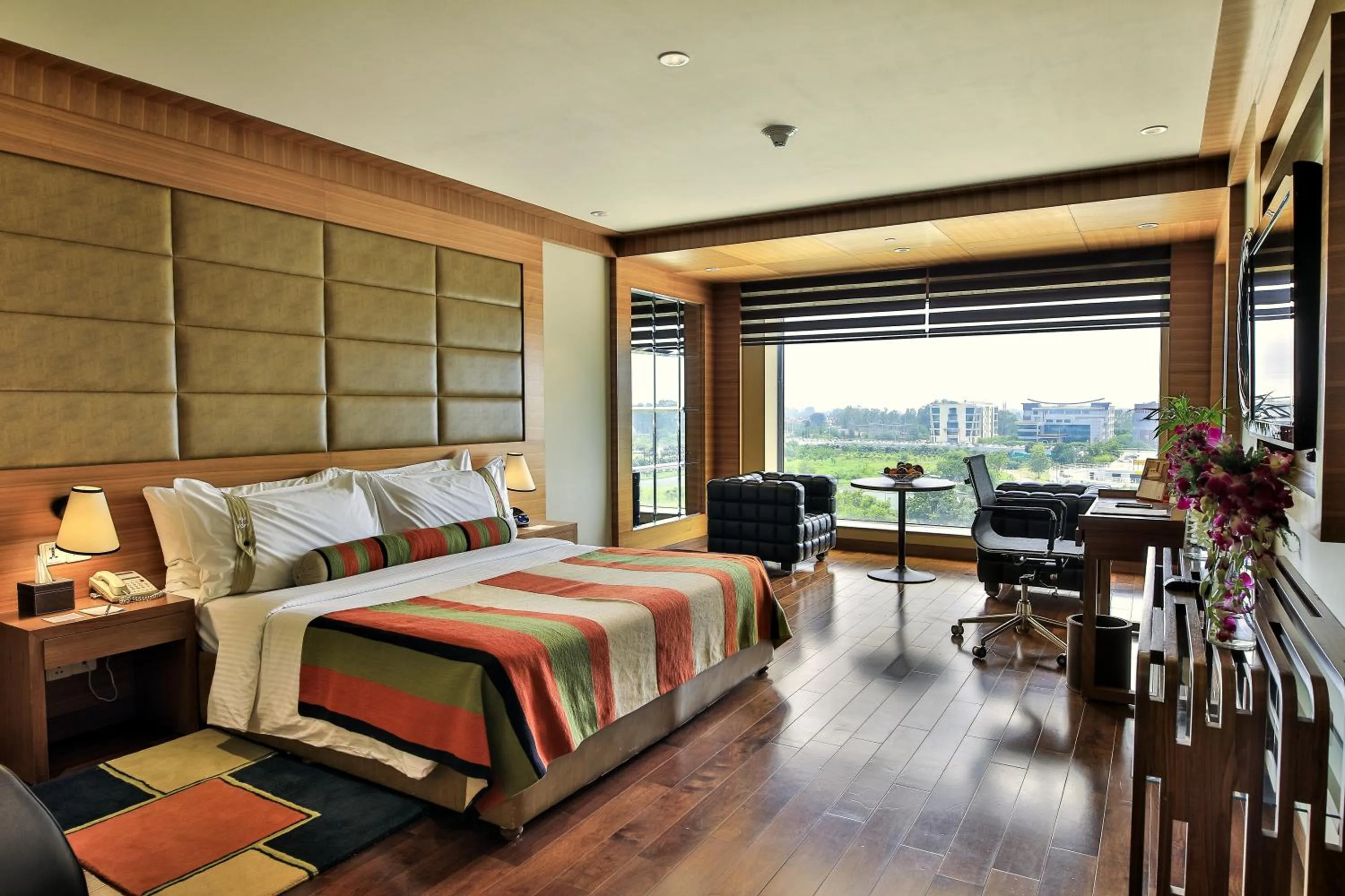 Photo of the whole room, Bed in The Lalit Chandigarh