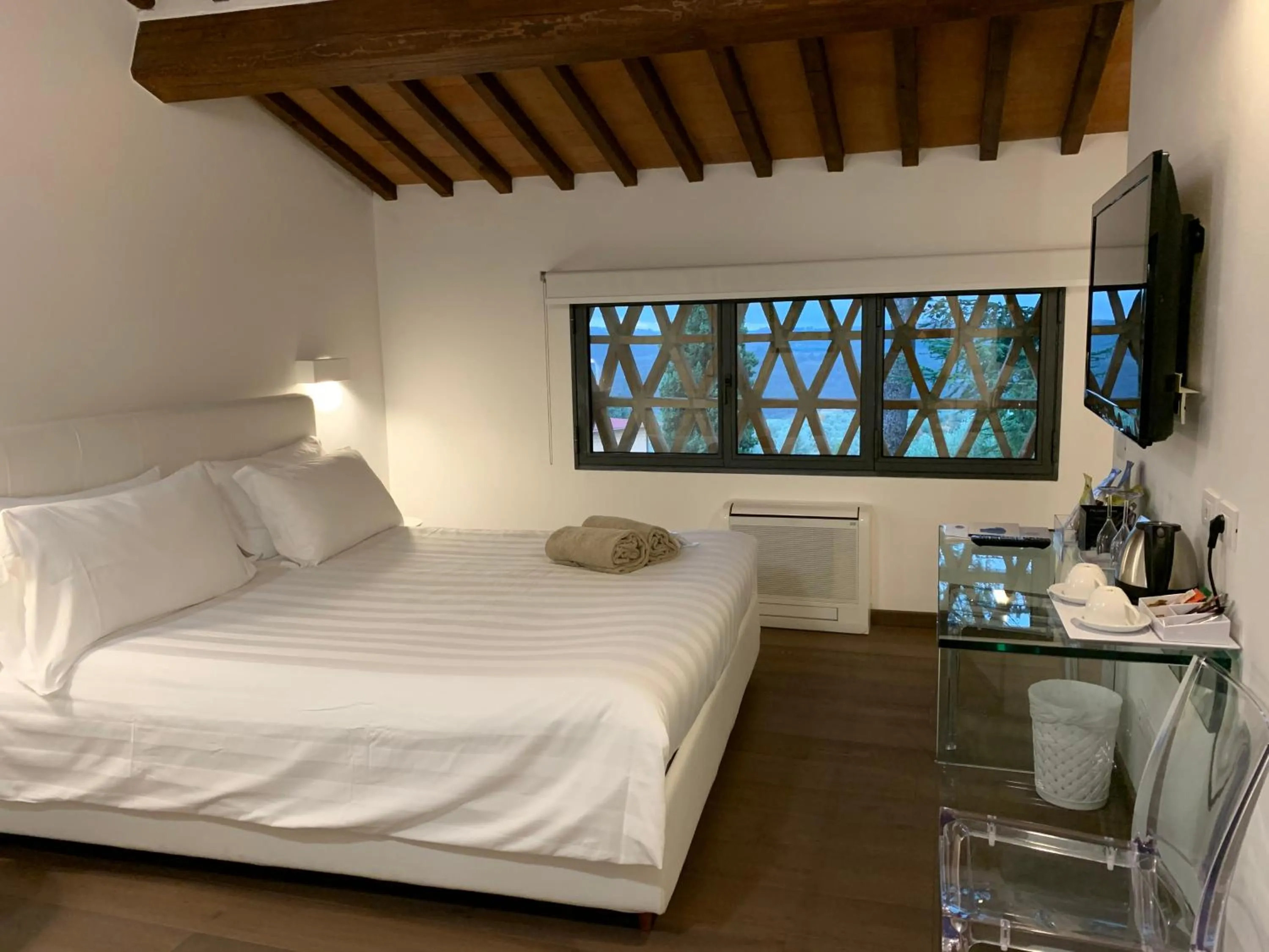 Bed in Villa I Barronci Resort & Spa