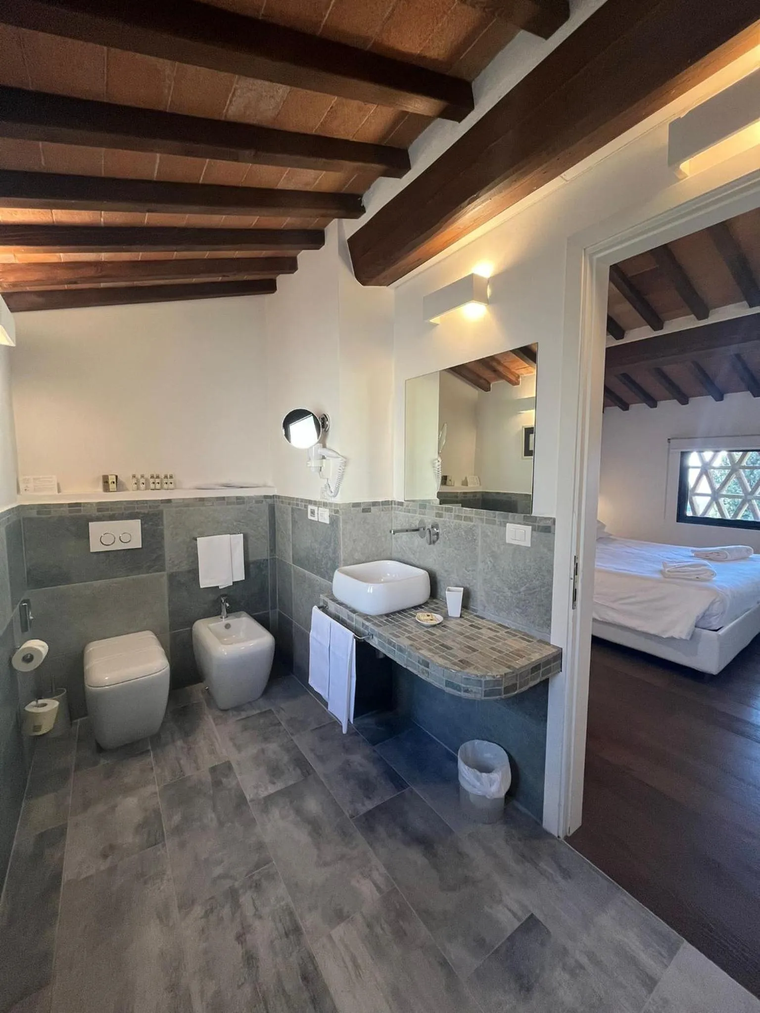 Toilet, Bed in Villa I Barronci Resort & Spa