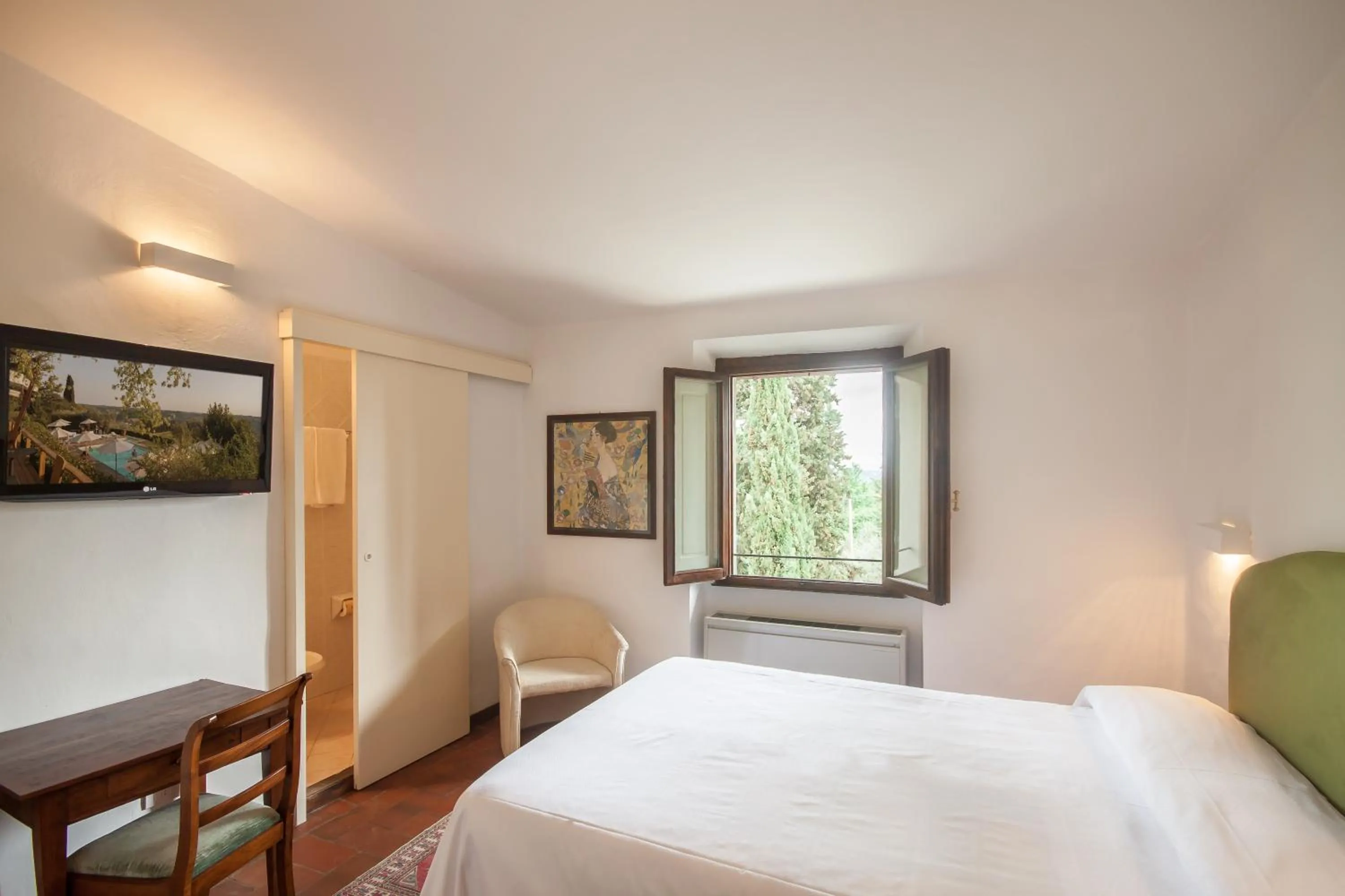 Bedroom, Bed in Villa I Barronci Resort & Spa