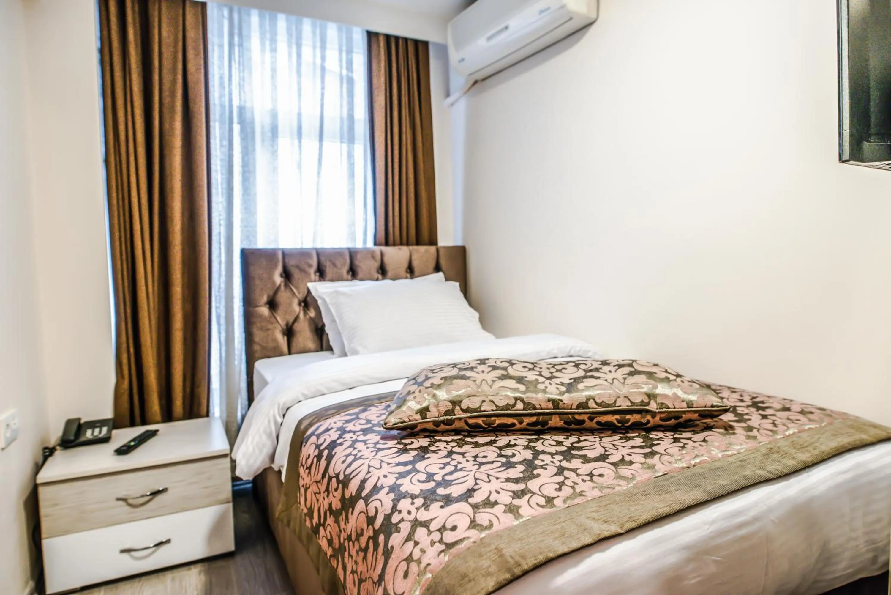 Bed in Lazz City Hotel