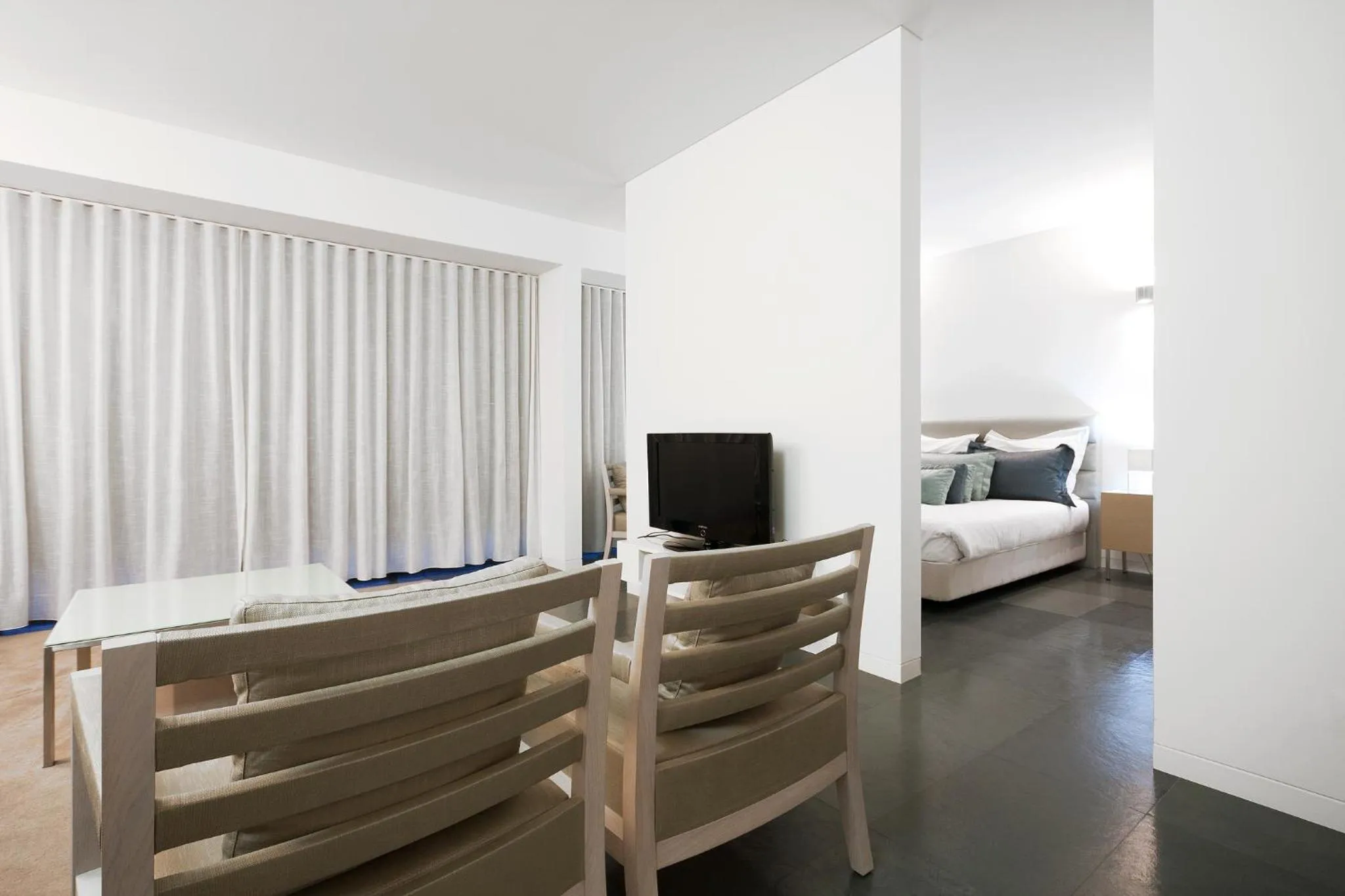 Living room, Bed in Troia Residence by The Editory - Apartamentos Ácala