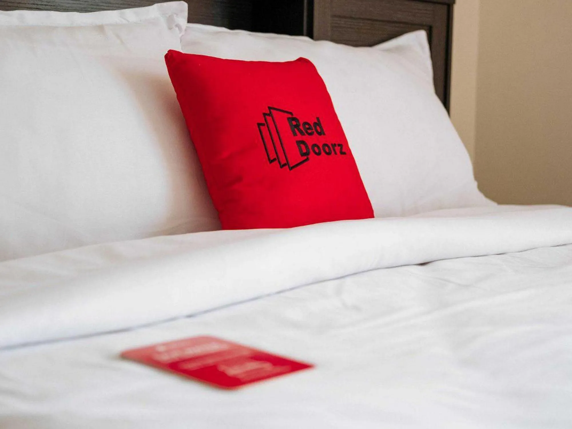 Bed in RedDoorz at Hotel Rumberpon Sorong