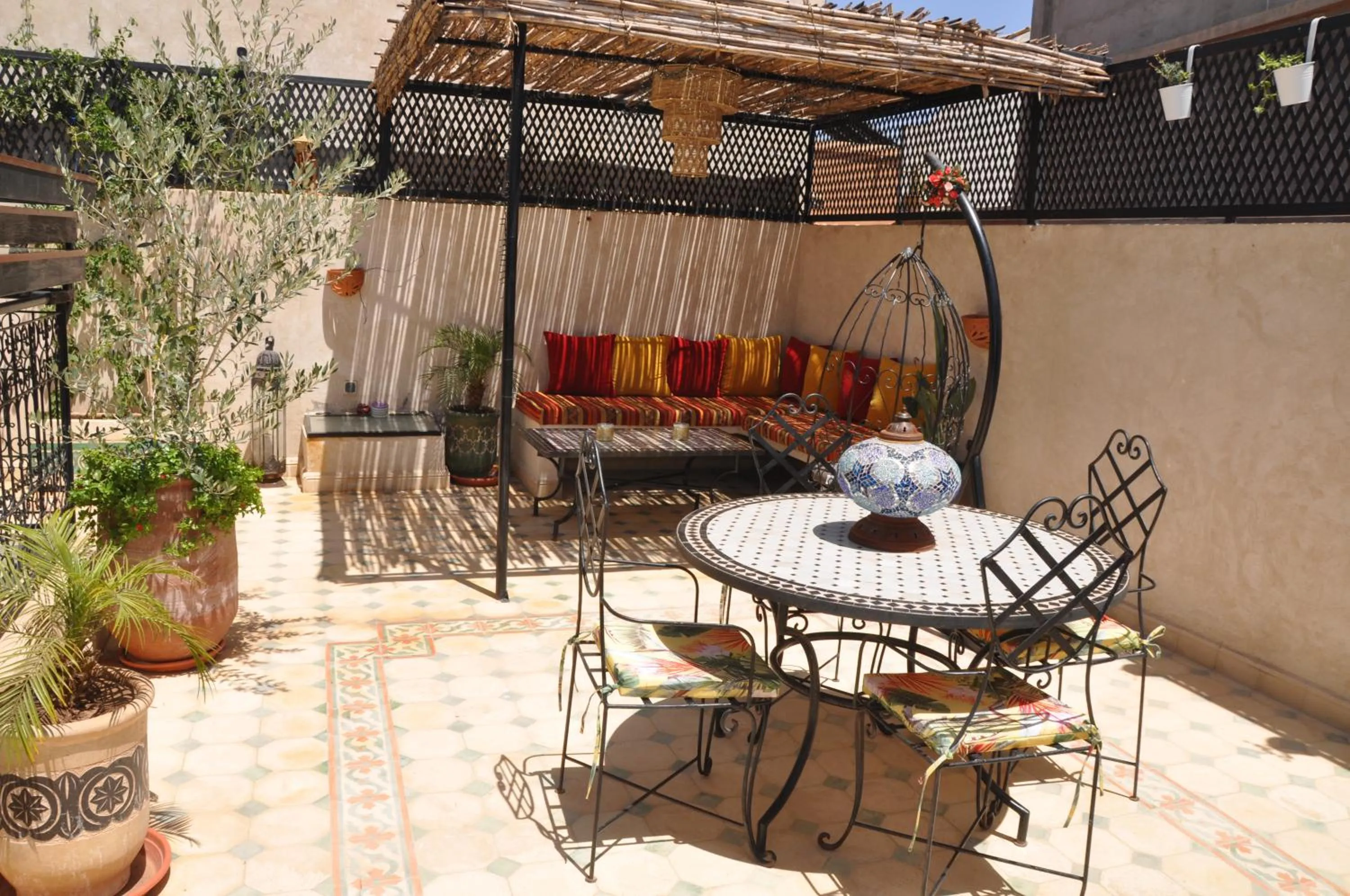 Communal lounge/ TV room in Riad Magnolia&SPA