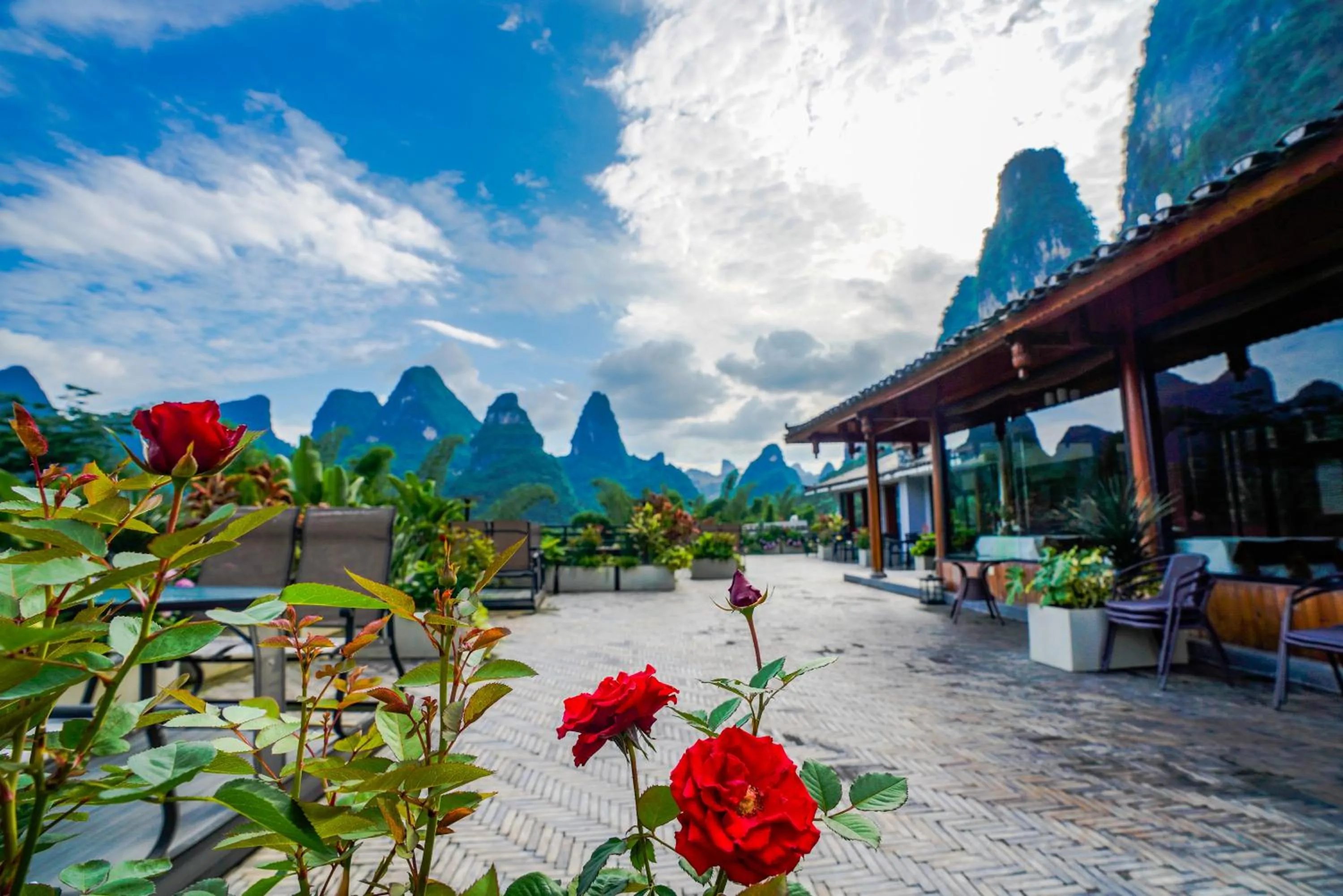 Balcony/Terrace in Yangshuo Xingping Shanshuiyao Resort - Free Train Station Pick Up -Stay 3 days promotion