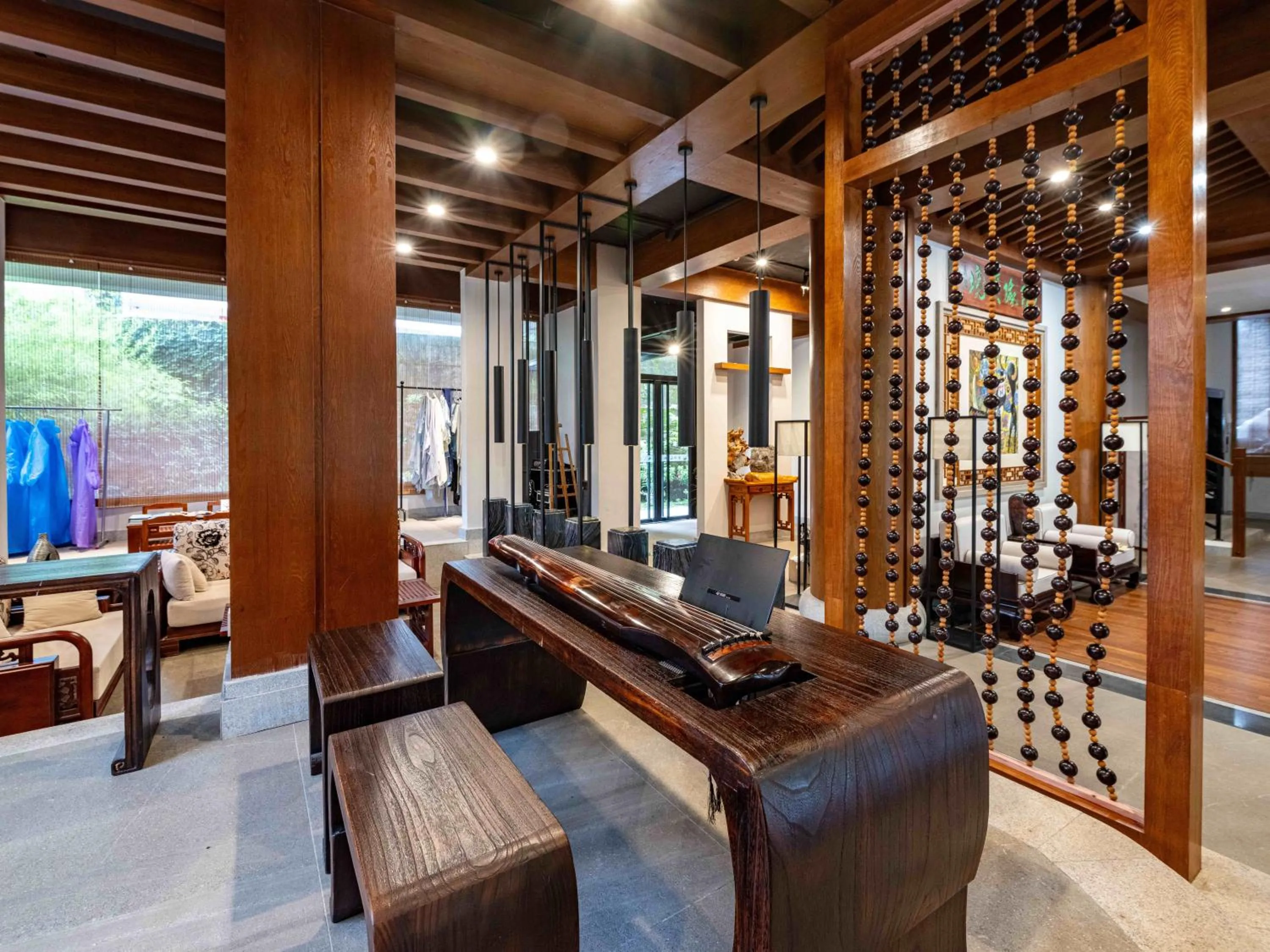Lobby or reception in Yangshuo Mountain River Ballad Hotel - Free Yangshuo Train Station Pick Up and Drop Off