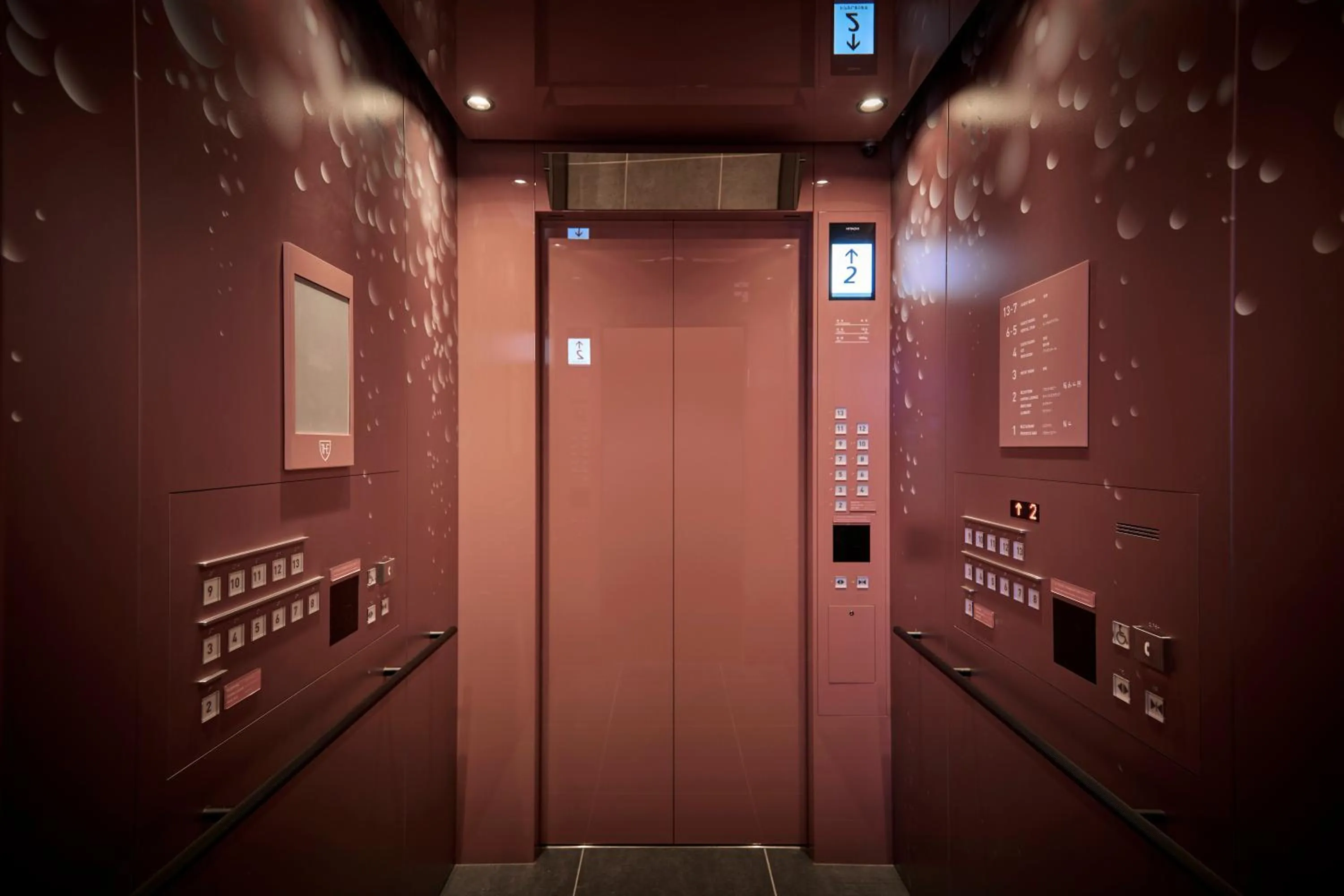 elevator in The Royal Park Canvas Ginza Corridor