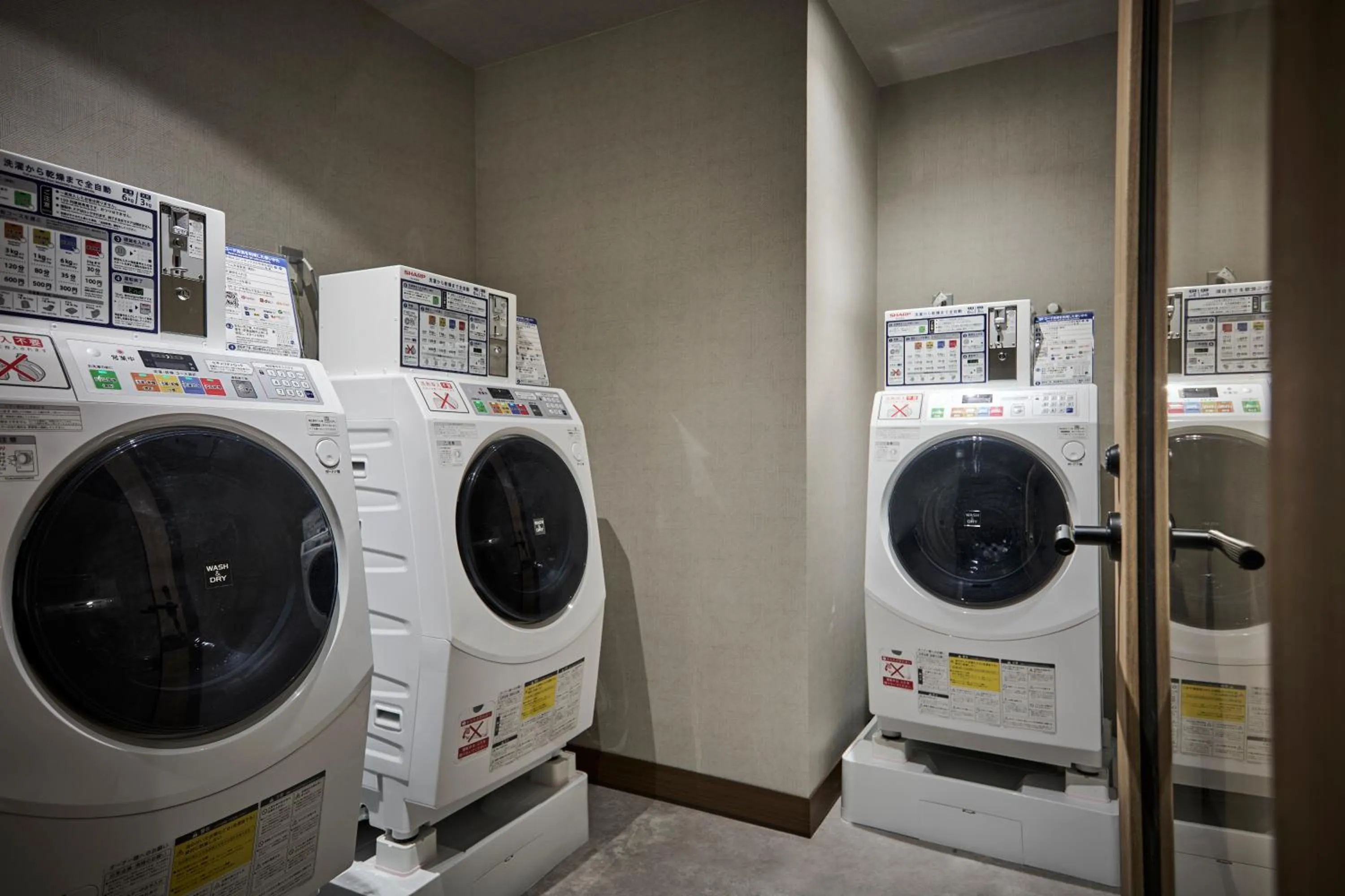 washing machine in The Royal Park Canvas Ginza Corridor