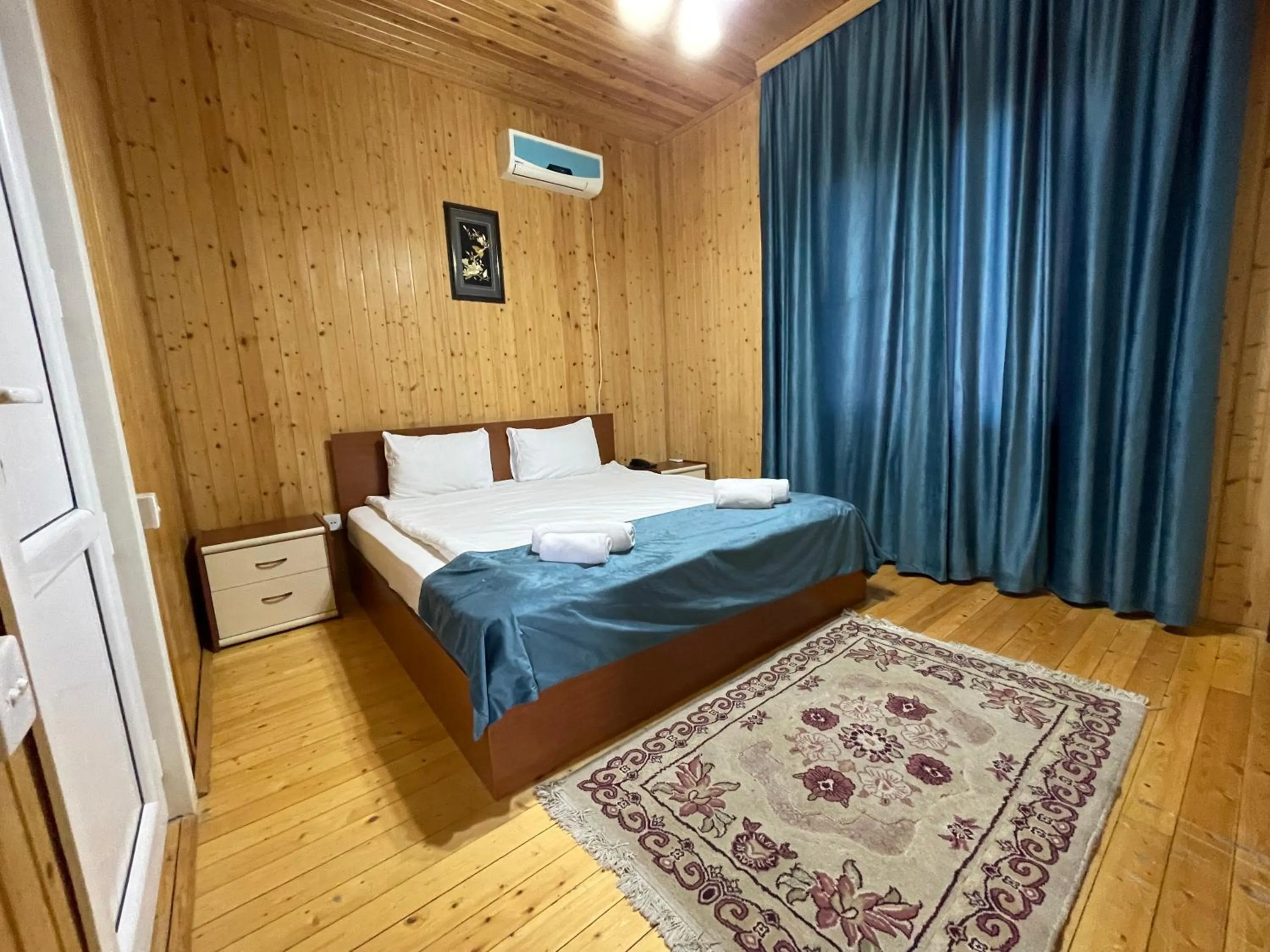 Bed in Deluxe Park Qusar Resort & Spa Hotel