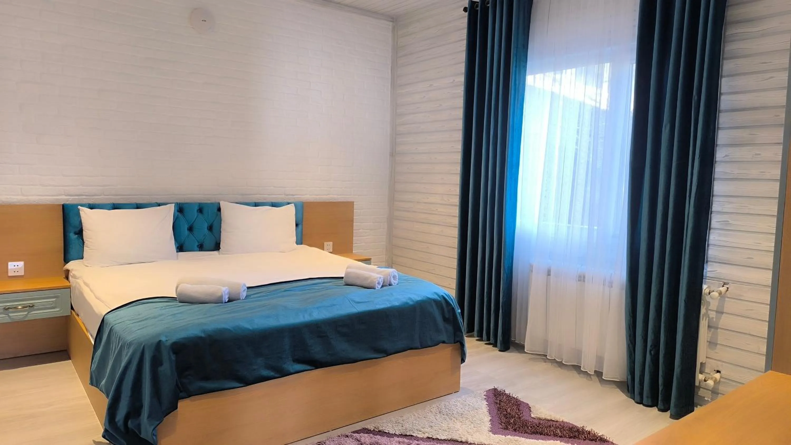 Bedroom, Bed in Deluxe Park Qusar Resort & Spa Hotel