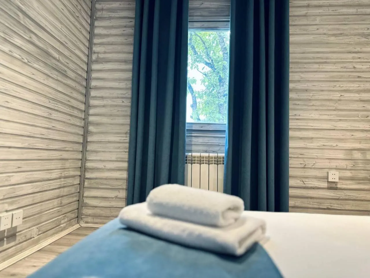 Bed in Deluxe Park Qusar Resort & Spa Hotel