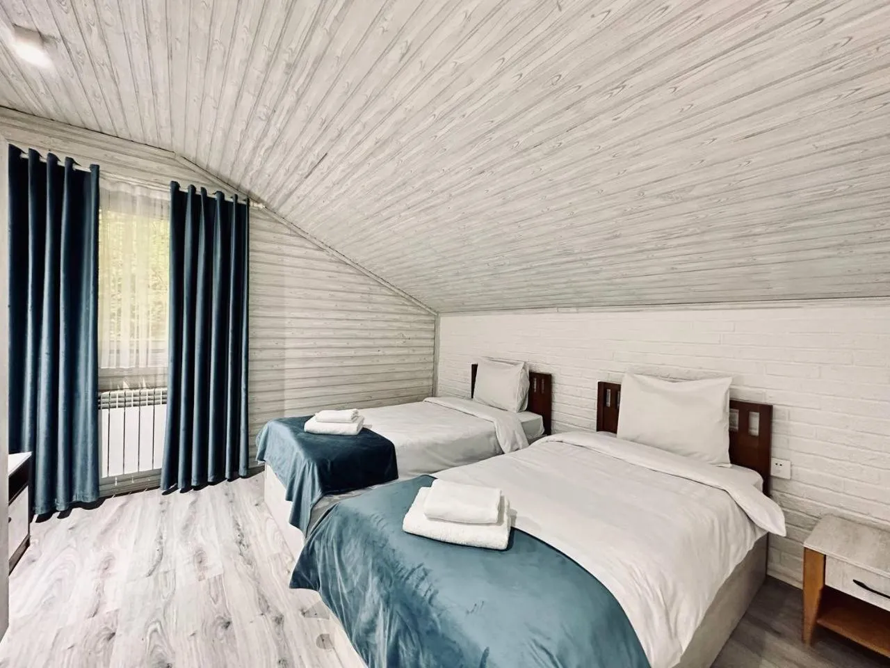 Bed in Deluxe Park Qusar Resort & Spa Hotel