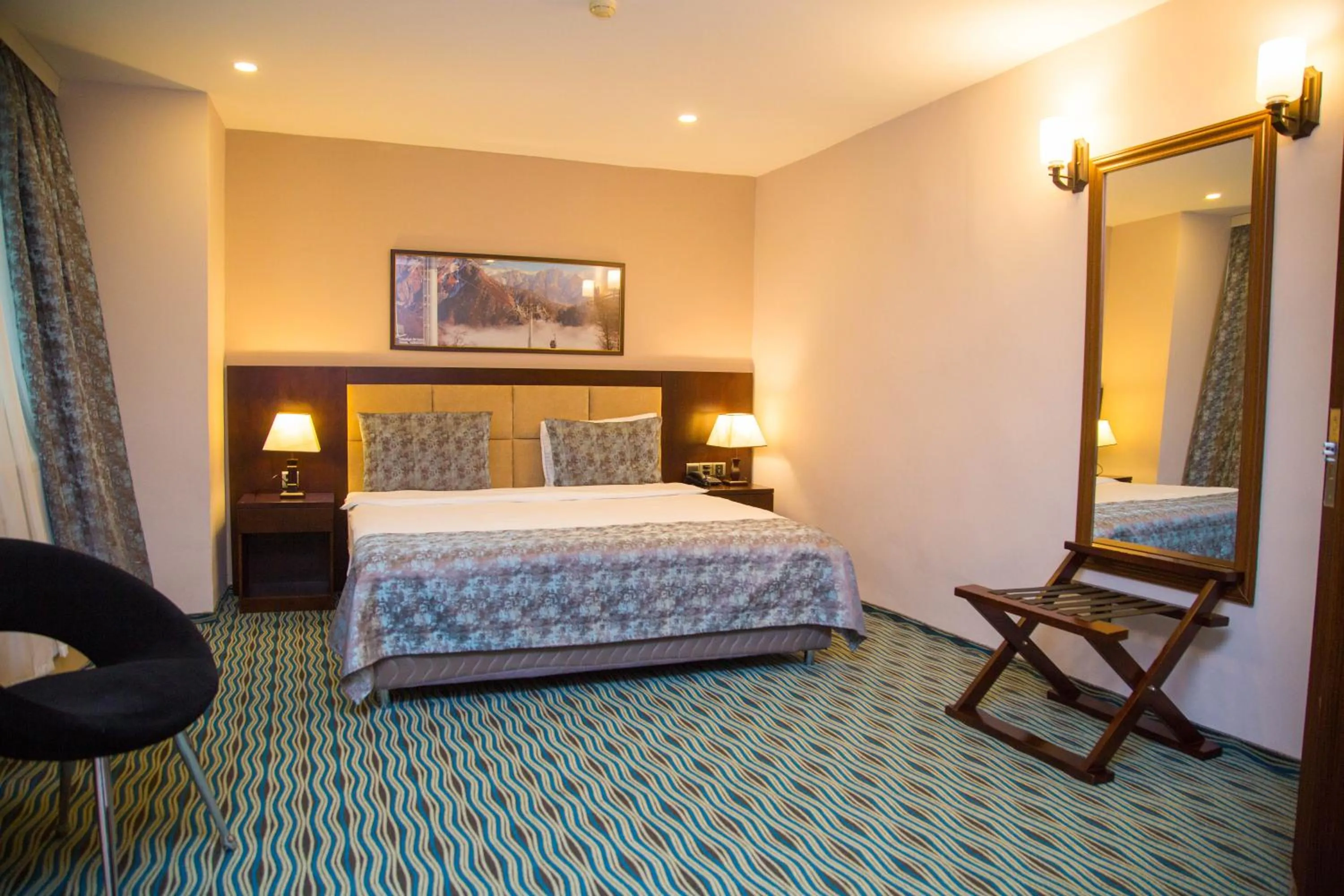 Bed in Ruma Port Hotel