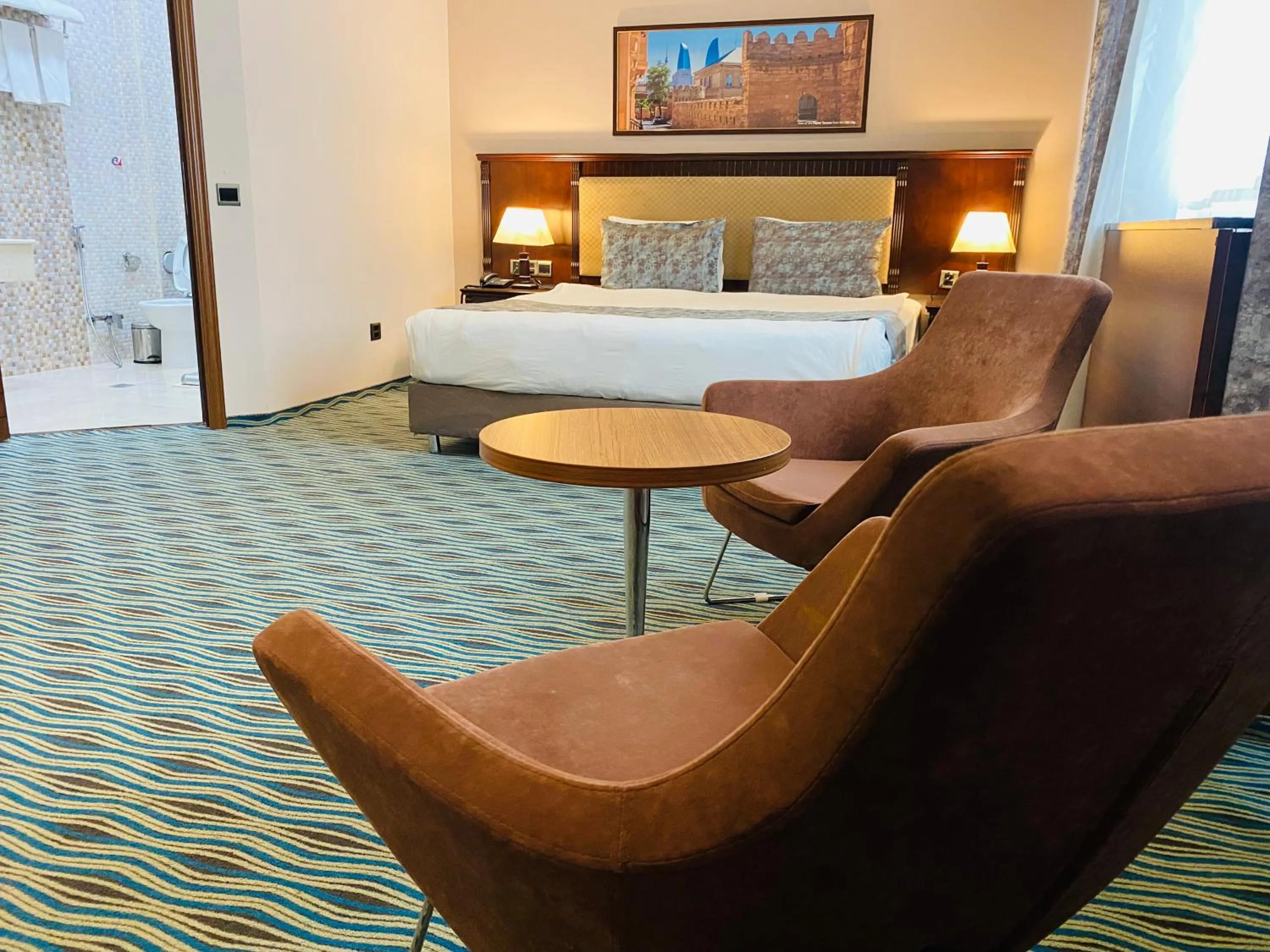 Living room, Bed in Ruma Port Hotel