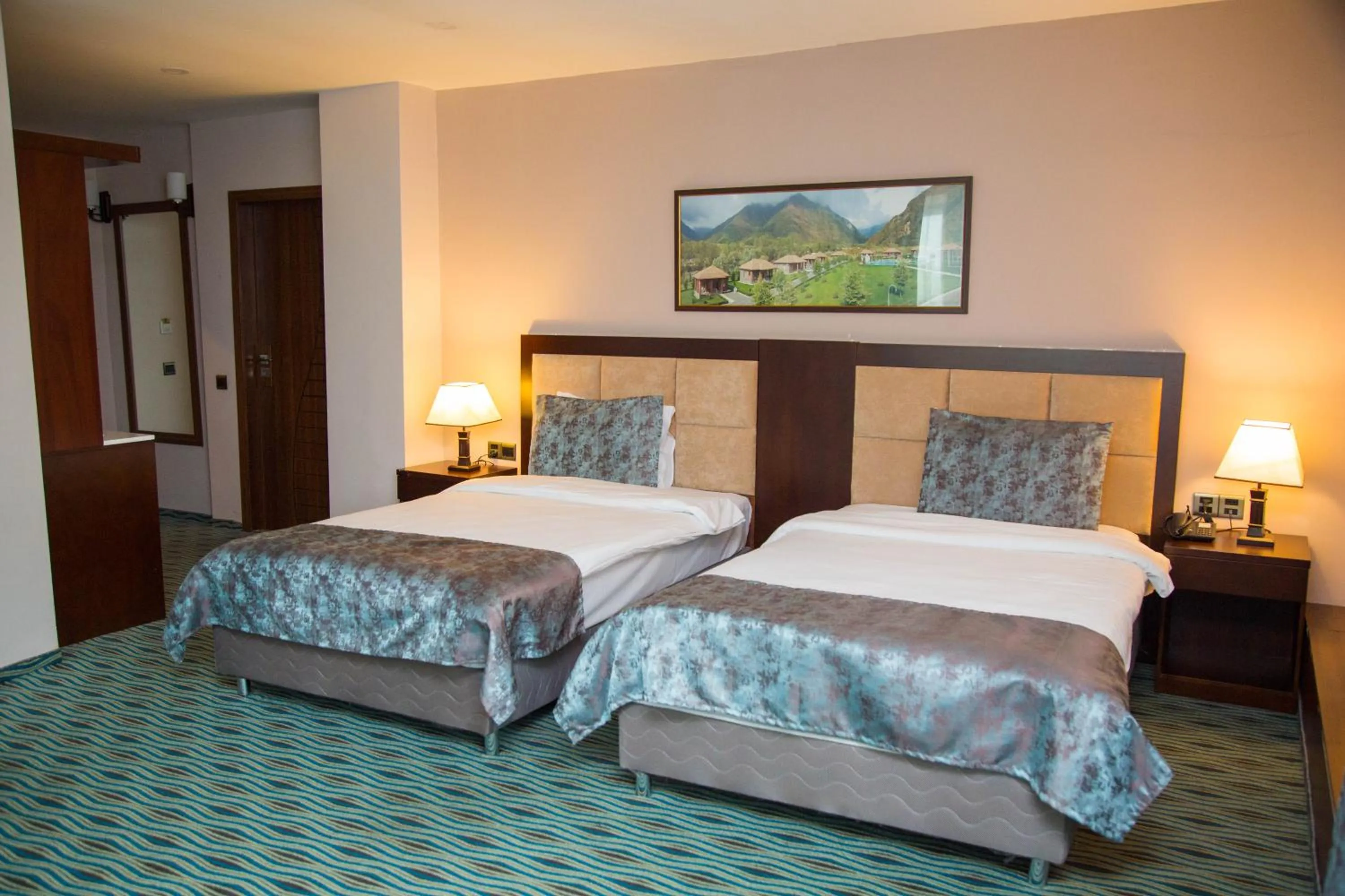 Bed in Ruma Port Hotel