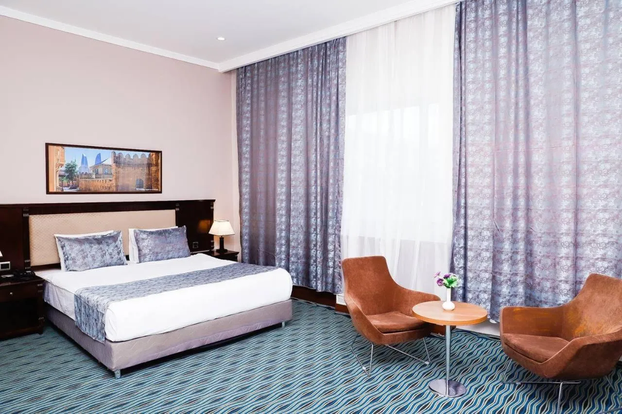 Bed in Ruma Port Hotel